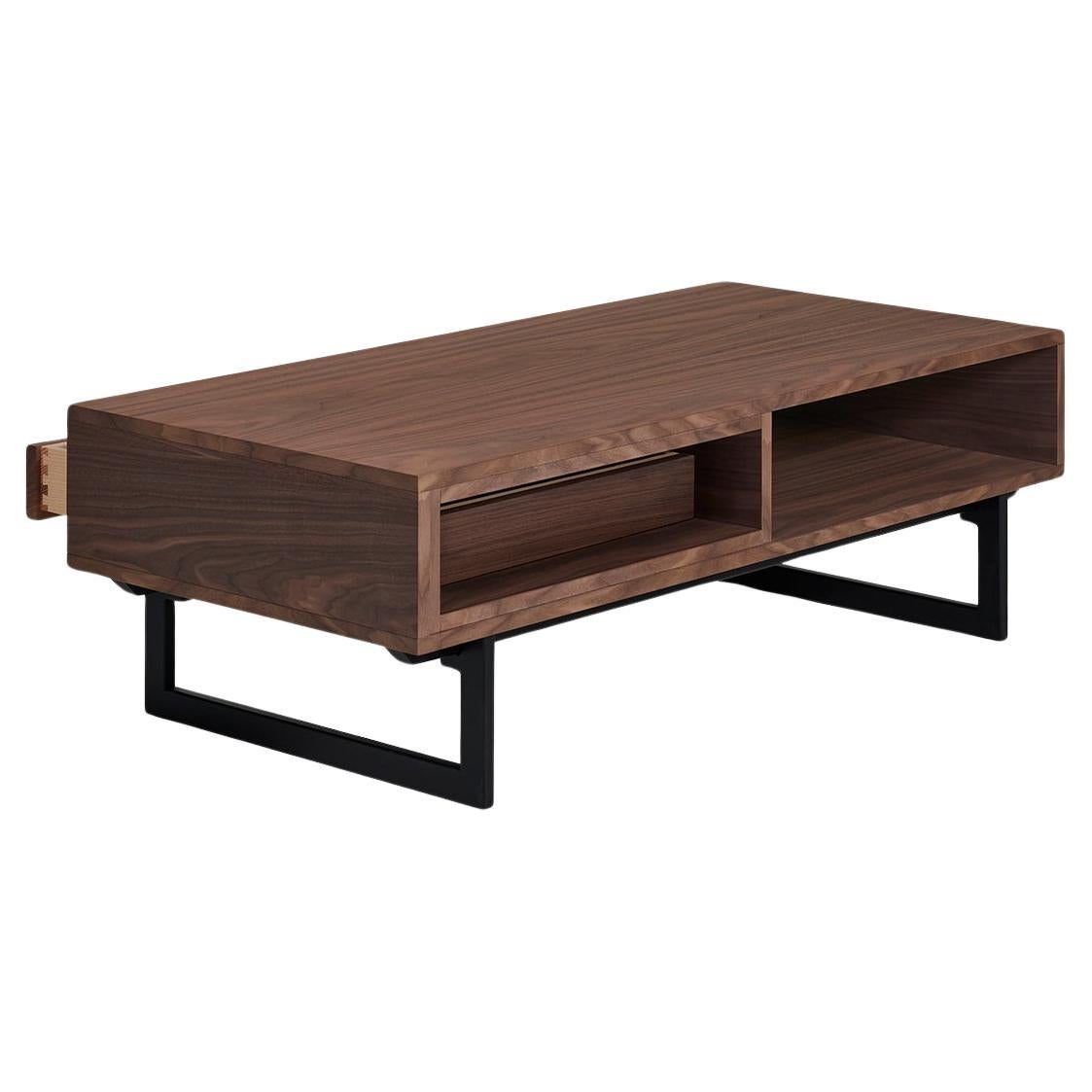 French 1-drawer coffee table in walnut & black iron feet, design by Christophe Lecomte For Sale