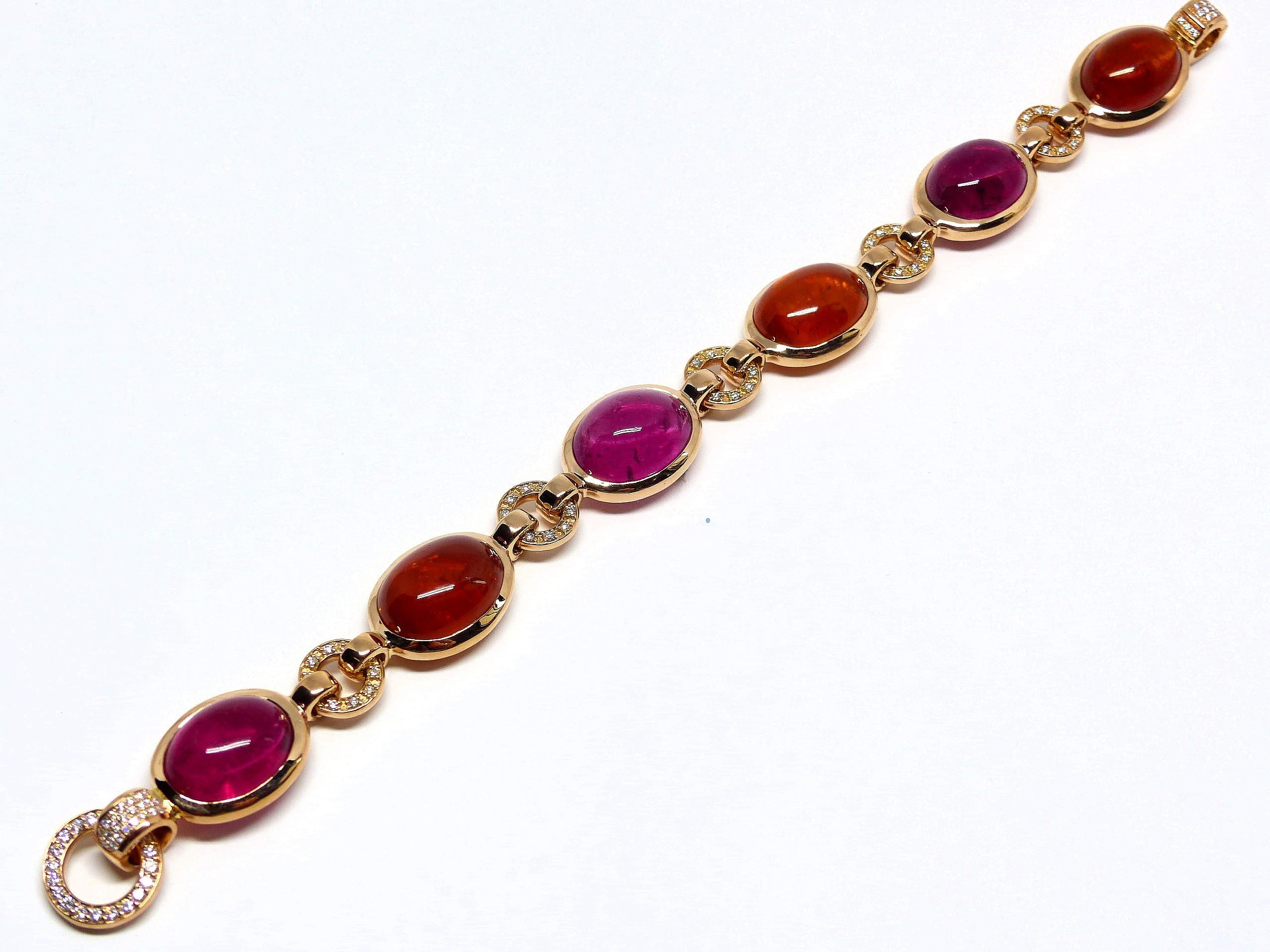 Thomas Leyser is renowned for his contemporary jewellery designs utilizing fine gemstones. 

This 18k red gold (38.26g) bracelet is set with 6x fine Rubelite & Mandarine Garnet Cabochons (oval, 16x12mm, 68.70ct) + 106x Diamonds (pavé, 1-1.5mm,