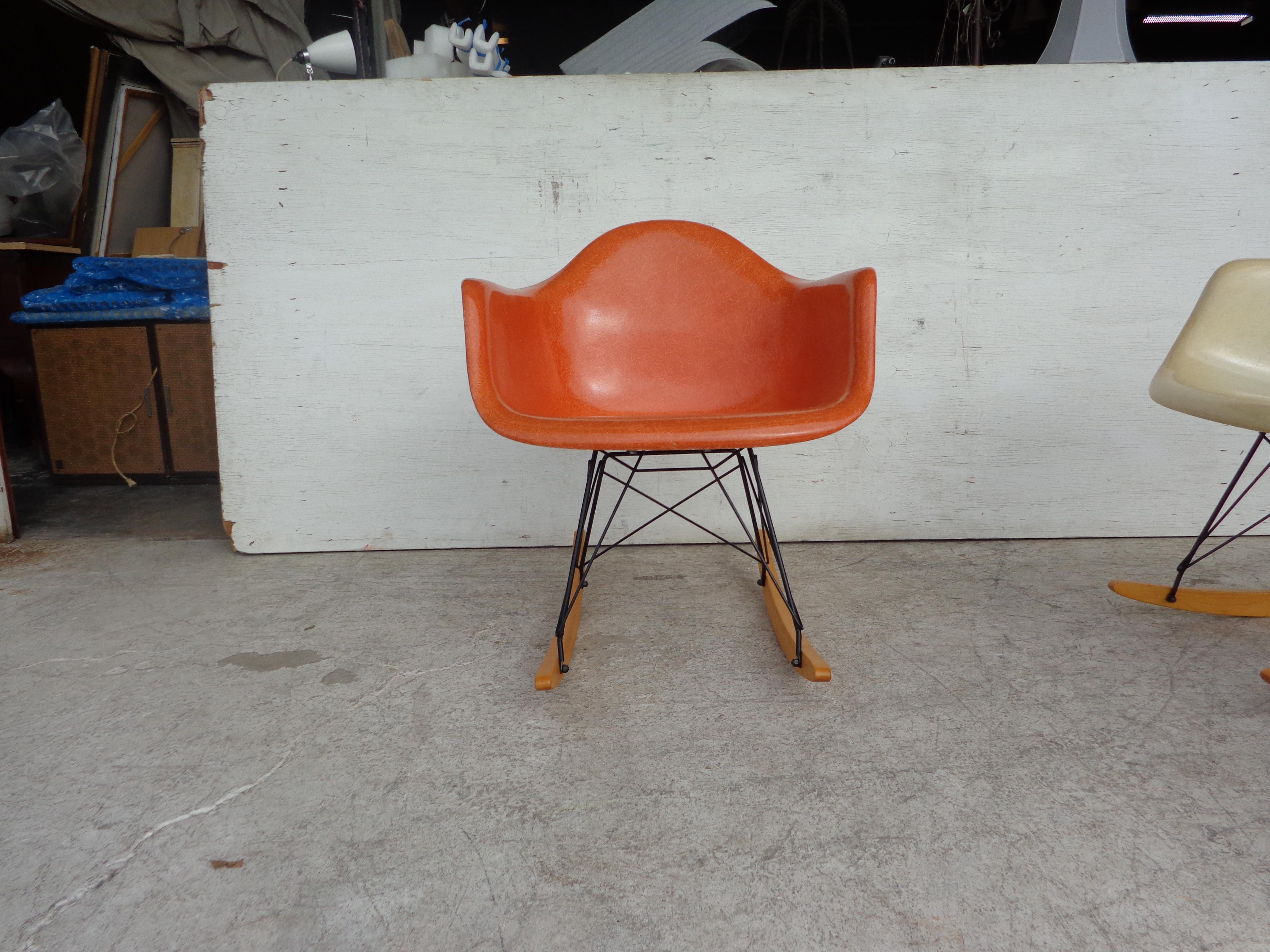 Herman Miller shell fiberglass rocker
Manufactured in the 1960s-1970s this rocker is one of the most iconic designs from Charles and Ray Eames.
 
RAR rocking chair by Charles and Ray Eames and manufactured by Herman Miller. Bright orange shell in