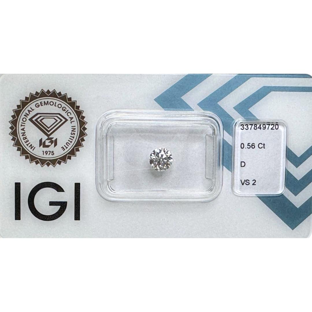 1 Ideal Cut with hearts and arrows cutting Natural Diamond w/0.56 ct - IGI Certified

This exceptional diamond epitomizes pure elegance and timeless beauty, featuring a single round brilliant cut stone that weighs 0.56 carat. This diamond comes with