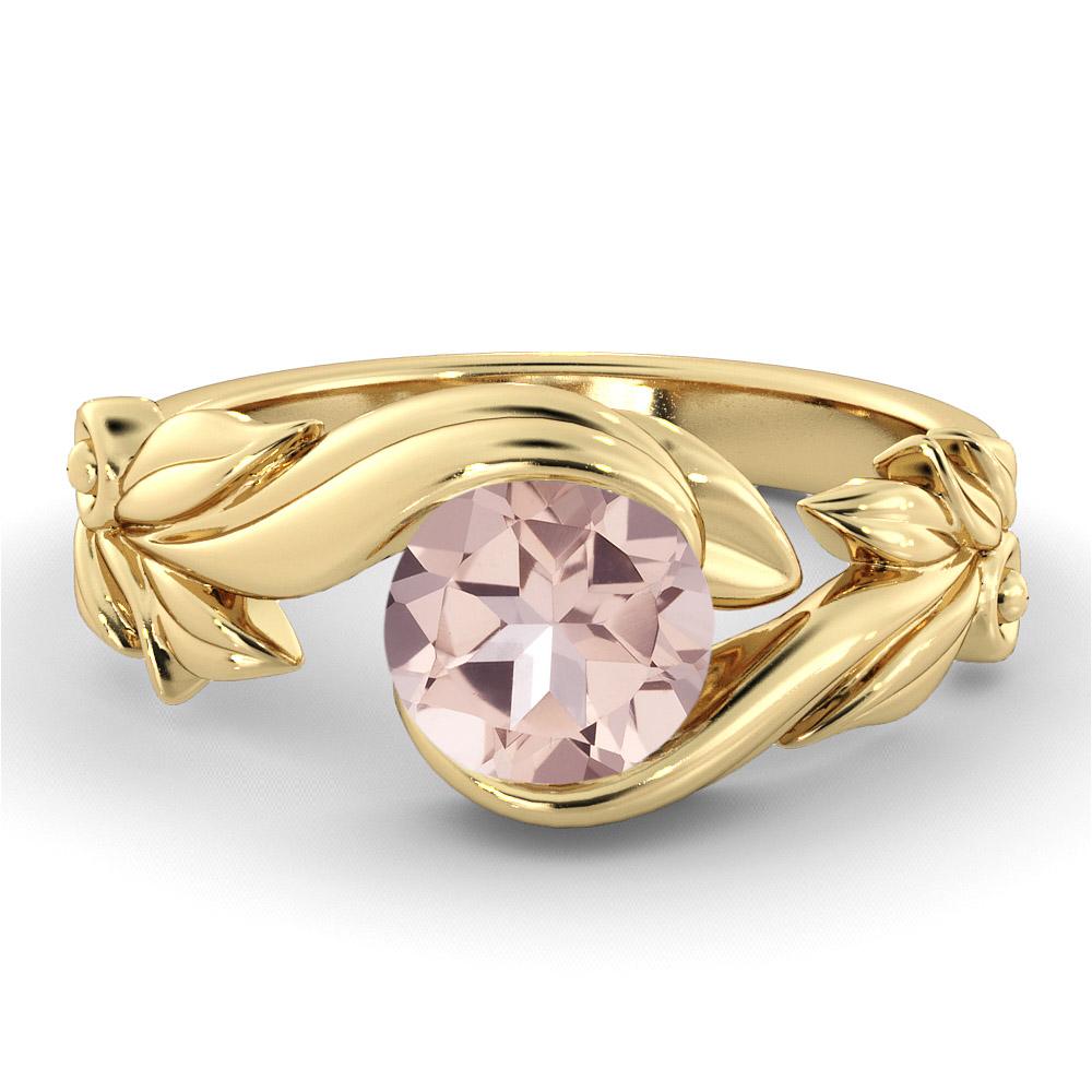 Unique solitaire flower leaf setting engagement ring set with a beautiful morganite center stone. Center stone is of 1 carat natural, round shape, peach/pink color morganite.
 
Main Stone Name: Morganite
Main Stone Weight: 1.00 ct.
Main Stone Color: