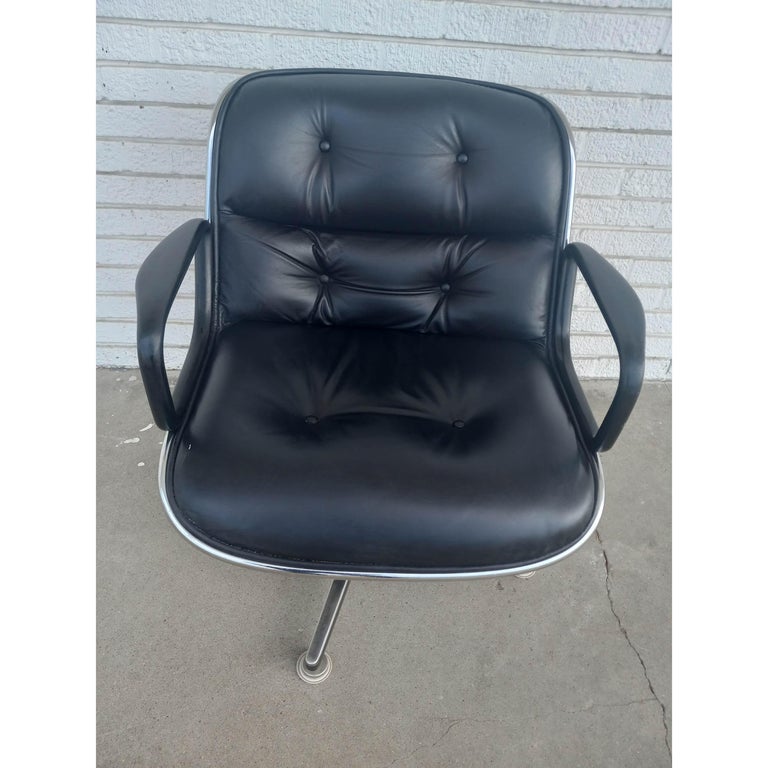 Knoll Pollock Executive Swivel armchair black leather
1956 Design 
Charles Pollock’s 1965 executive chair, now considered one of Knoll’s most memorable designs, features a chrome rim that supports the chair both structurally and visually