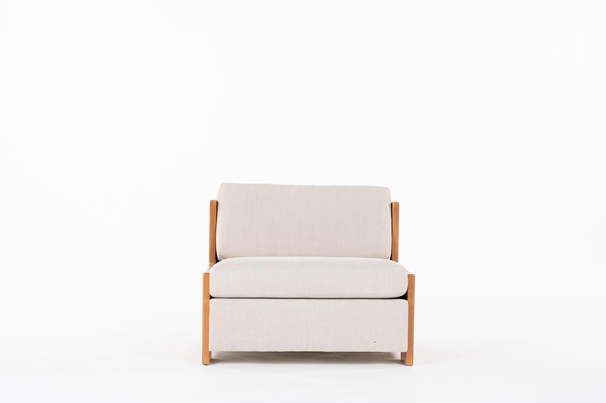 Maison Regain lounge chair in solid elm wood and cover in natural linen. 
Model designed and manufactured in 1980. Nice radical and minimalist shapes. Very comfy.