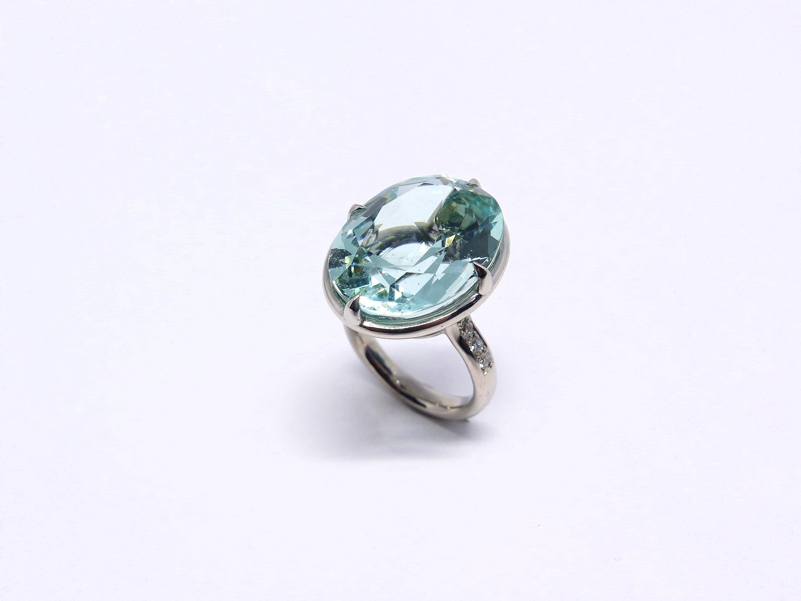 Contemporary Ring in White Gold with 1 Green Beryl oval 21x16mm and Diamonds. For Sale