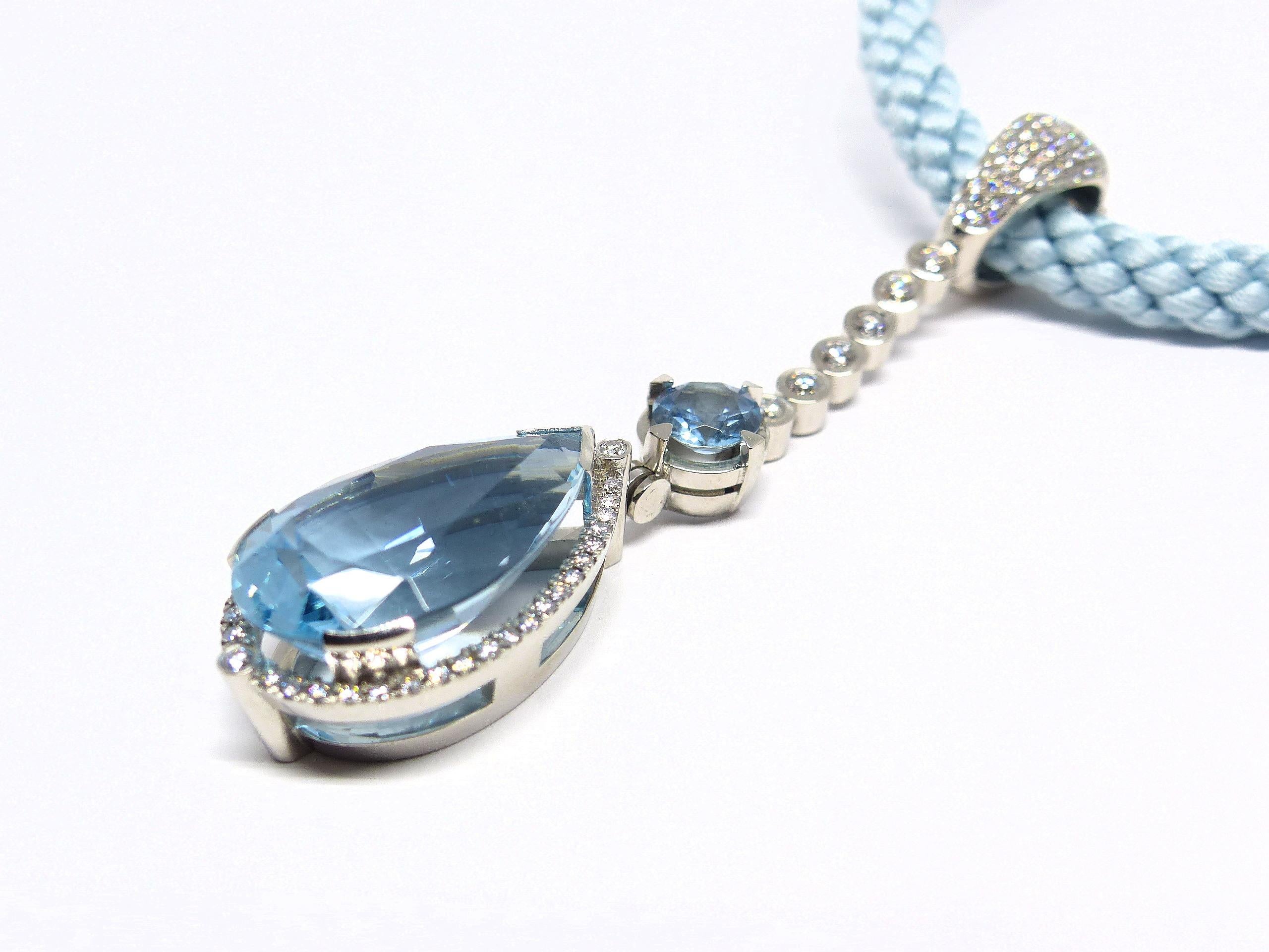 Thomas Leyser is renowned for his contemporary jewellery designs utilizing fine gemstones.

This 950 platinum (32.81g) pendant is set with 1x fine Aquamarine in a magnificient blue color (pearshape, 25x15.5x11.5mm, 21.58ct) + 1x Aquamarine (round,
