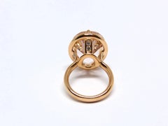 Ring aus Roségold mit 1 Morganit oval 21x16 mm und Diamanten