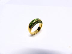 Ring in Rose Gold with Tsavorites Square and Round Channel Setting.