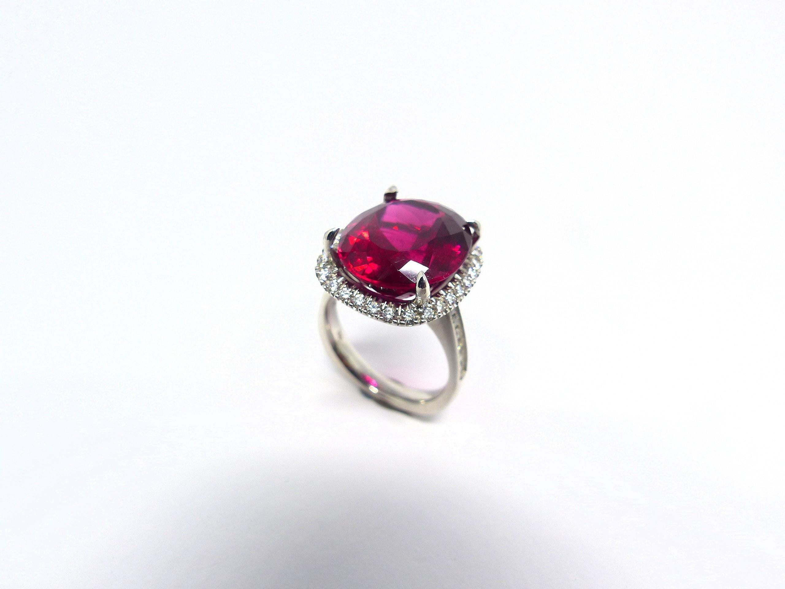 Oval Cut Ring in White Gold with 1 Rubellite 12, 90ct. and 42 Diamonds 0, 55ct.. For Sale