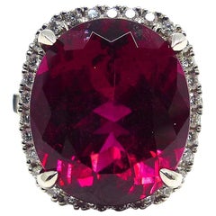 Ring in White Gold with 1 Rubellite 12, 90ct. and 42 Diamonds 0, 55ct..
