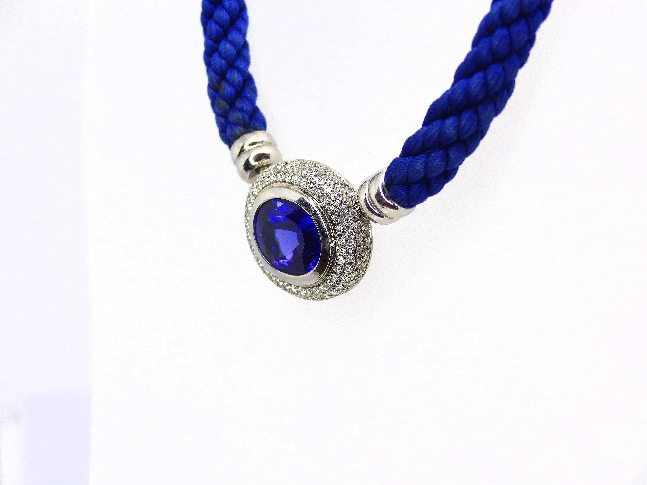 Thomas Leyser is renowned for his contemporary jewellery designs utilizing fine gemstones.

This 18k white gold (19g) clasp/pendant is set with 1x fine Tansanite in magnificient intensiv blue colour (oval, 16.3x13.6mm, 10.14ct) + 140x Diamonds