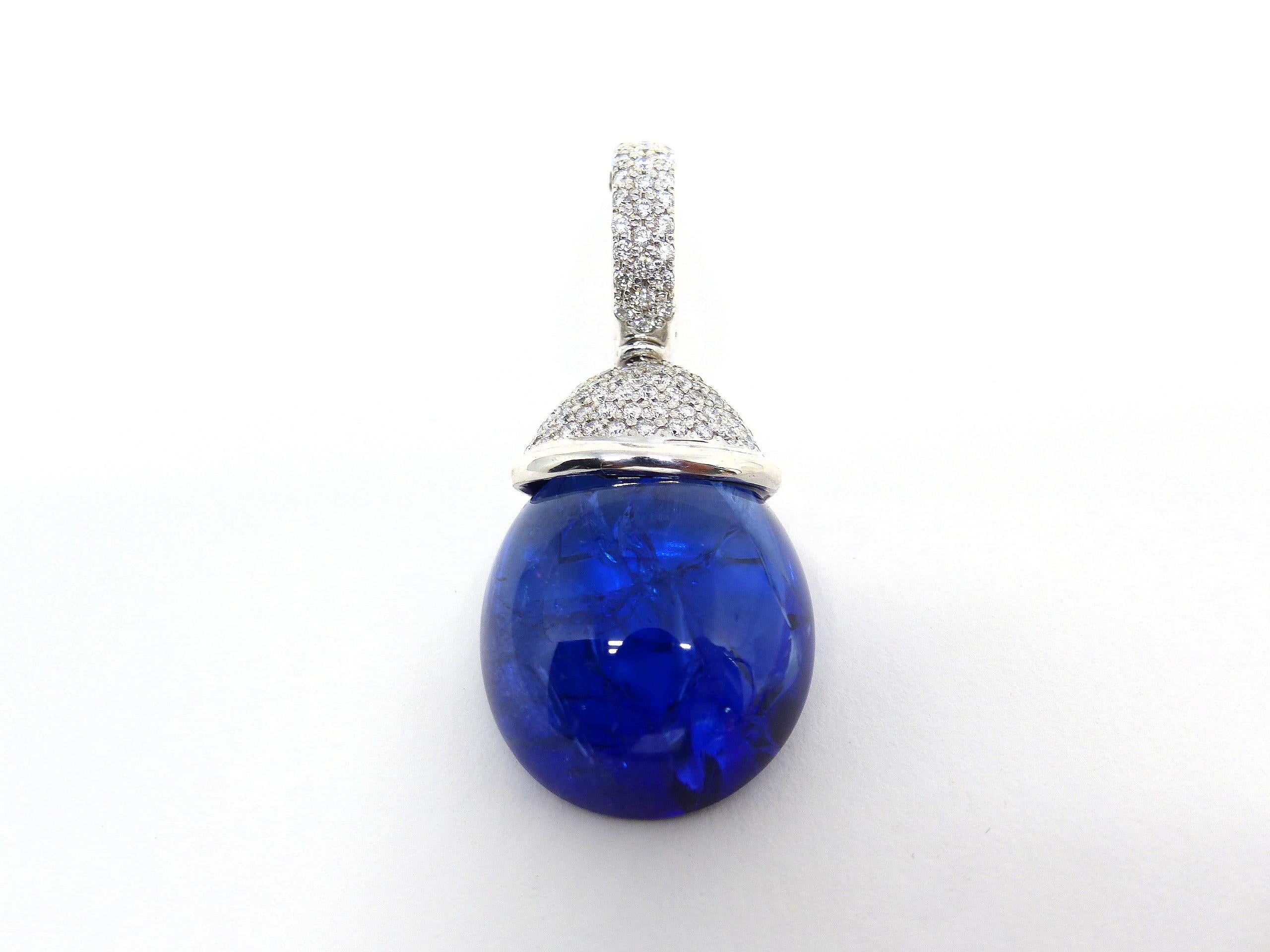 Thomas Leyser is renowned for his contemporary jewellery designs utilizing fine gemstones.

This 18k white gold (13.30g) pendant is set with 1x fine Tanzanite in intensiv blue colour (briolett-cut, pear shape, 22x19x9.5mm, 34.63ct) & 91x Diamonds