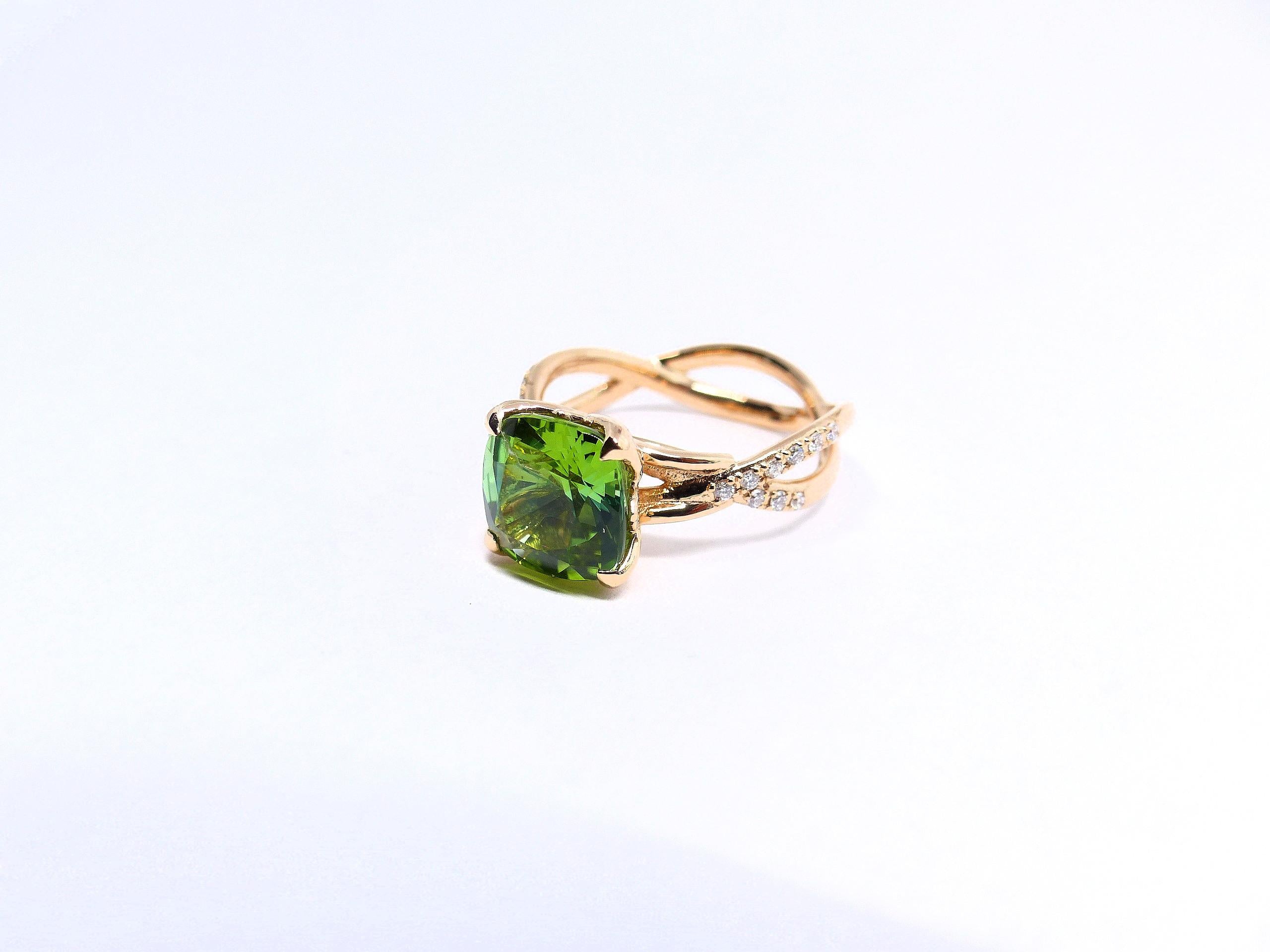 Thomas Leyser is renowned for his contemporary jewellery designs utilizing fine gemstones.

This 18k red gold ring (5.04g) is set with 1 fine Tourmaline in magnificient greenish colour and large facettes (cushion cut, 9x9mm, 2.94 carat) and