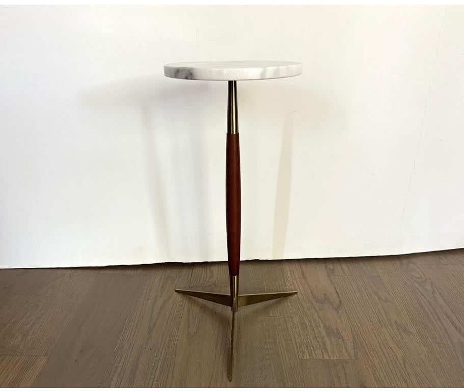 Decorate a den or living room with this striking side or drink table from the late 20th century. In the likes of Paul McCobb for Thonet and George Nelson & Associates for Herman Miller. Each minimalist side table features a round white and grey