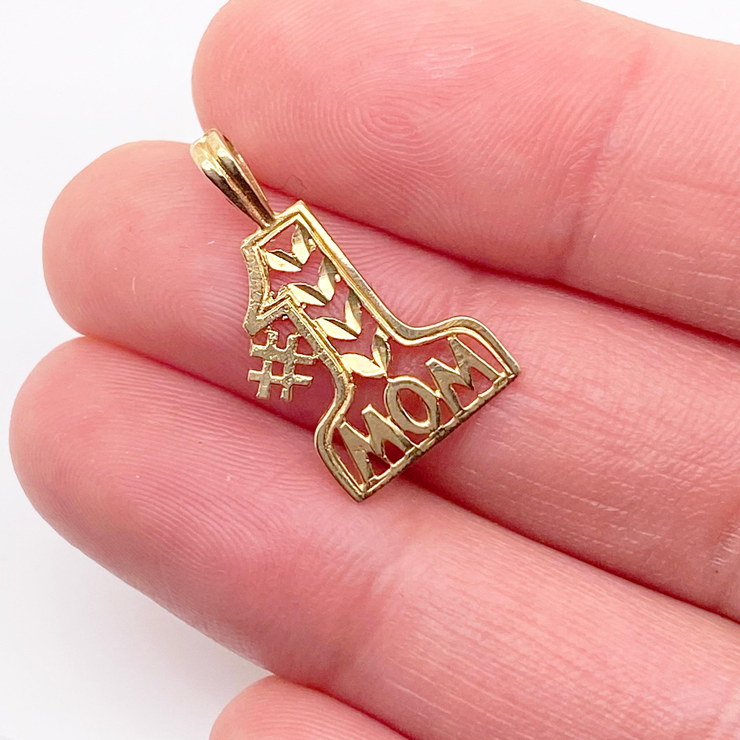 Mom is the Best and deserves to be #1! This 14 karat yellow gold charm is a very sweet, sentimental gift. This can be used on a charm bracelet or as a pendant on a necklace. Either way, let your mother know that she is a significant person in your