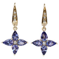 $1 No Reserve!  2.86ct Tanzanite 
0.10 Carat Diamonds, 14k Yellow Gold Earrings