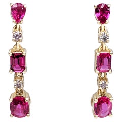 $1 NO RESERVE! NO HEAT 1.40Ct Ruby 
0.08Ct Fancy Pink 14kt Yellow gold Earrings