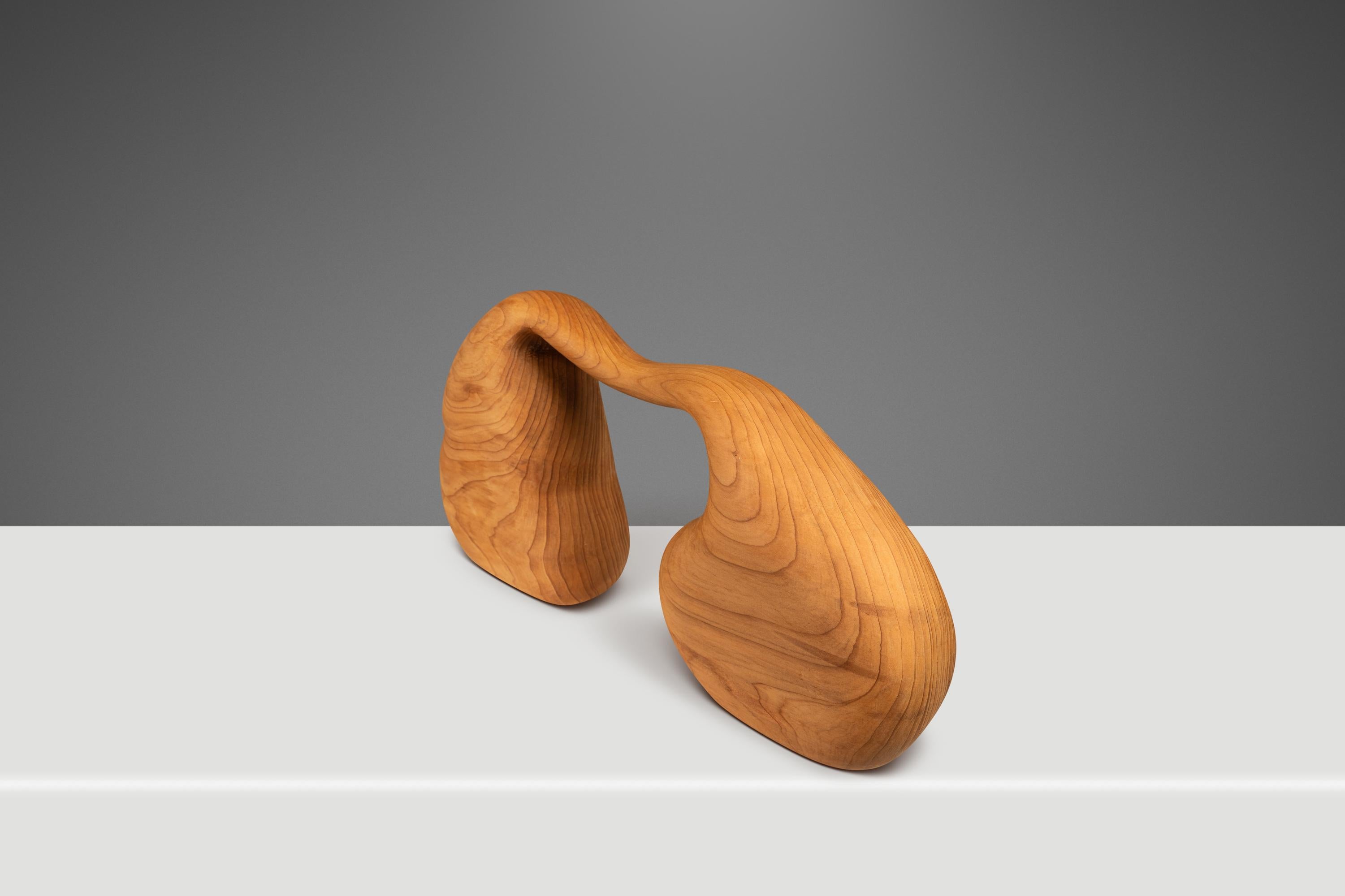  Introducing a one of one, hand-carved Organic Modern sculpture in solid cypress. Dubbed 