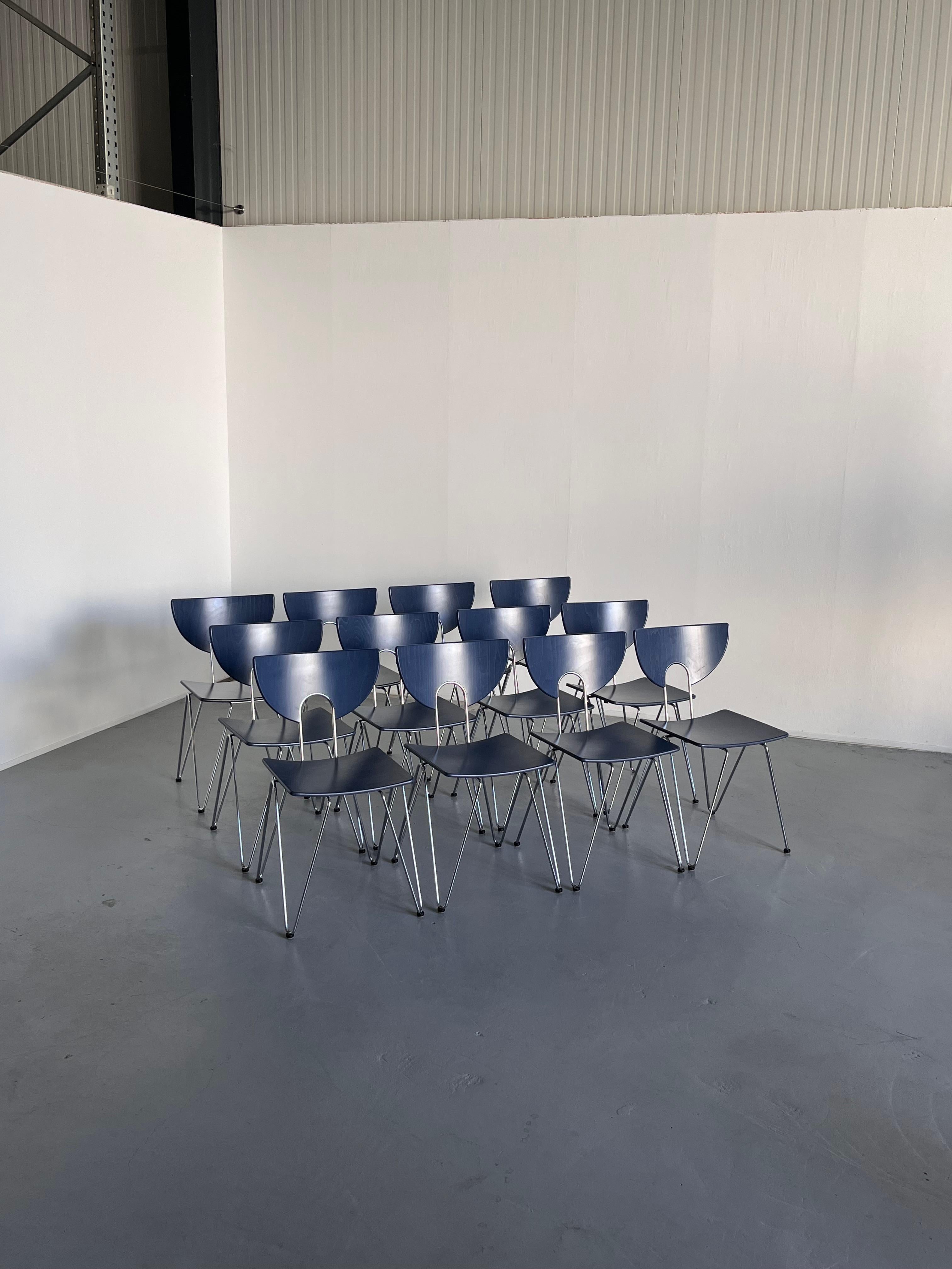 Set of twelve vintage Kusch+Co stackable postmodern dining chairs in a blue-grey lacquered finish.
Chromed metal structure and wooden seat and backrest.

Designed in the 1980s, early 1990s production.
High-quality.

In very good vintage condition