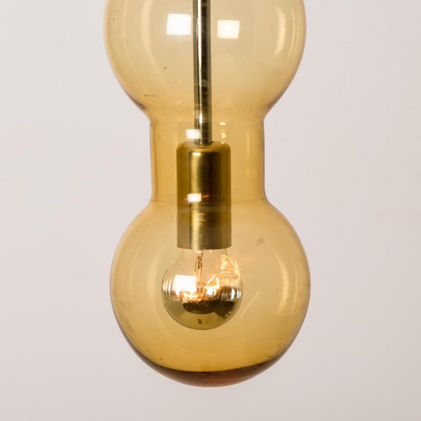Post-Modern 1 of 14 Glass Amber Pedant Lights, Doria, 1960s For Sale