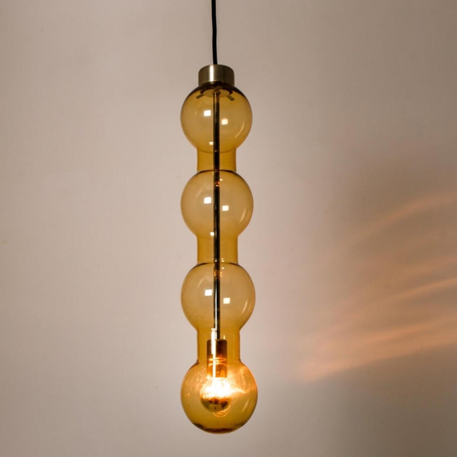 1 of 14 Glass Amber Pedant Lights, Doria, 1960s In Good Condition For Sale In Rijssen, NL