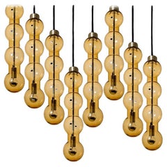1 of 14 Glass Amber Pedant Lights, Doria, 1960s