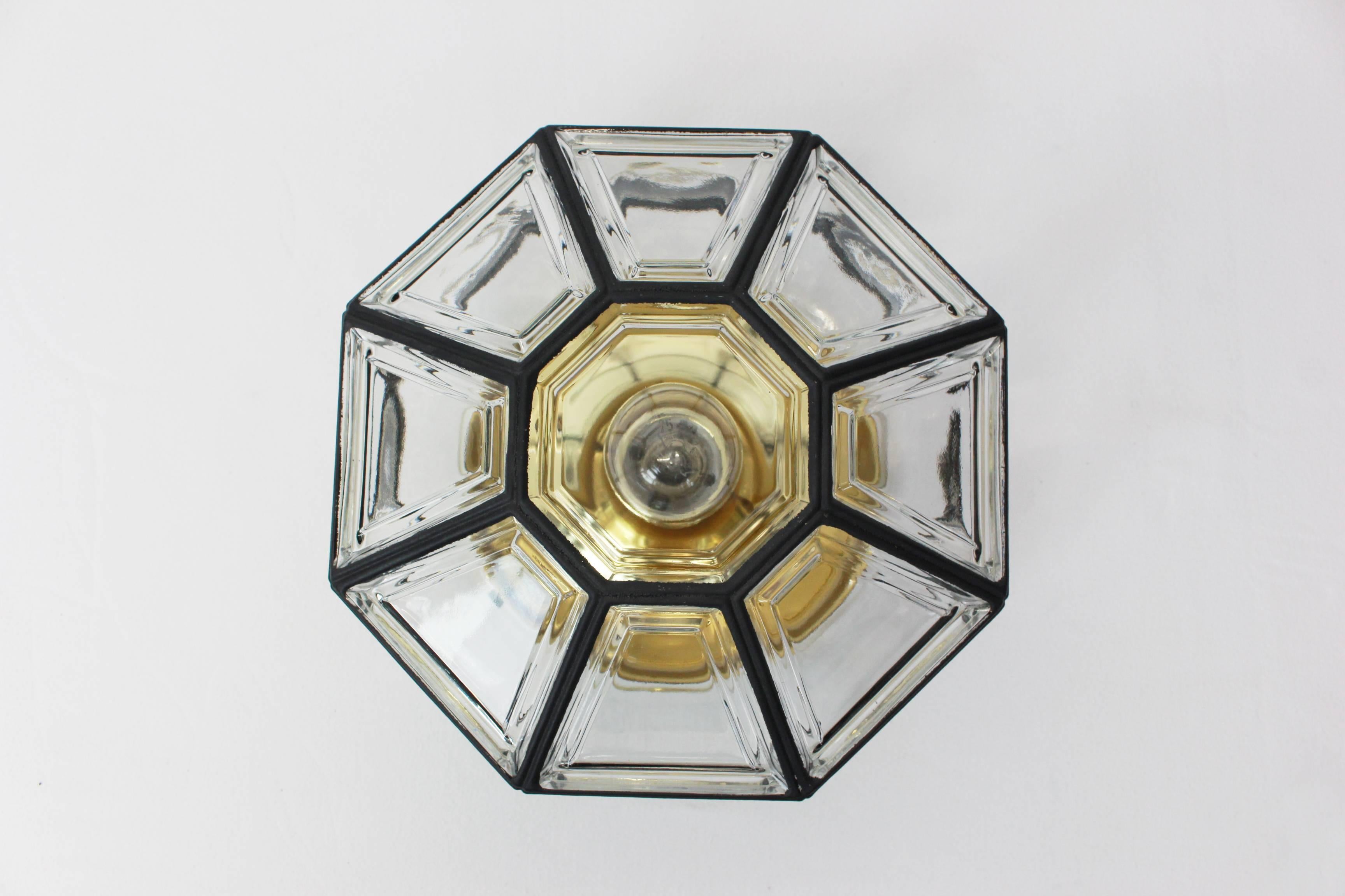 1 of 15 Minimalist iron and clear glass flushmount manufactured by Limburg Glashütte, Germany, circa 1960-1969. Octagonally shaped lantern and multifaceted clear glass.

High quality and in very good condition. Cleaned, well-wired and ready to