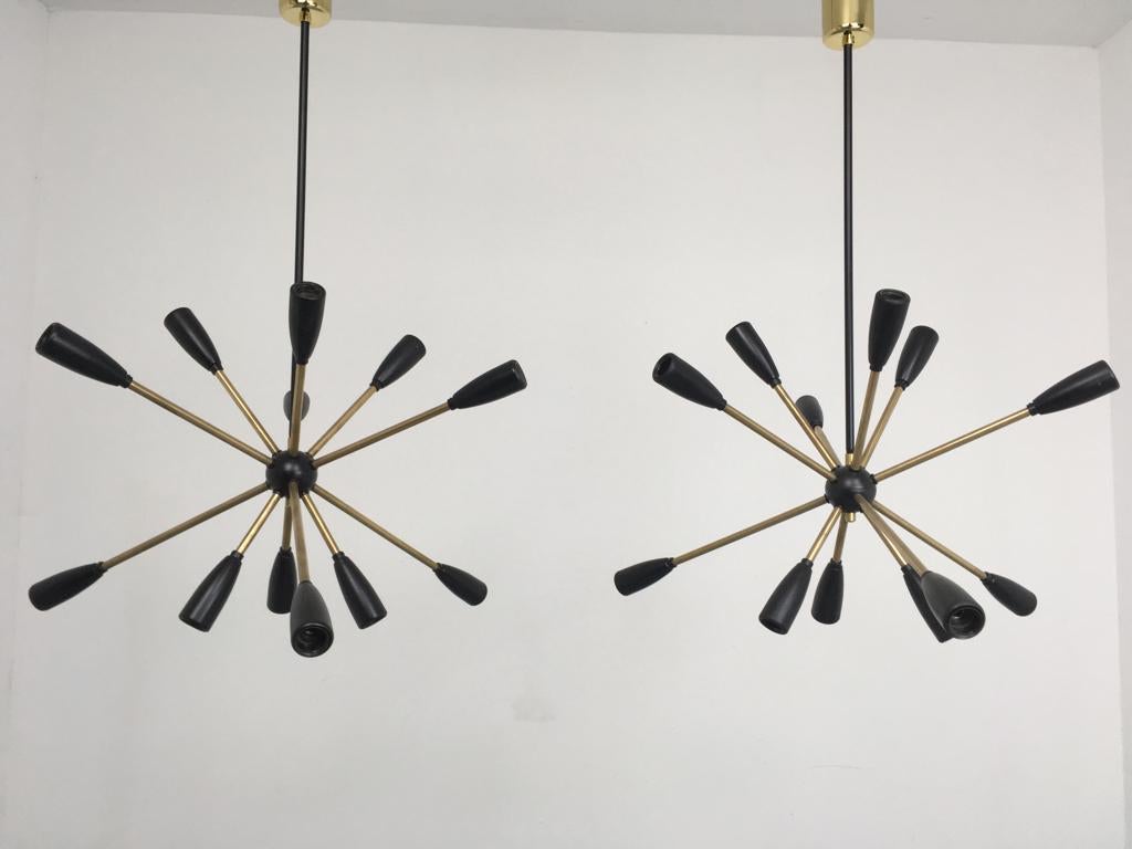 1950s Sputnik lamp in black. 

12 x E14 Bulbs.

To be on the safe side, the lamp should be checked locally by a specialist concerning local requirements.
