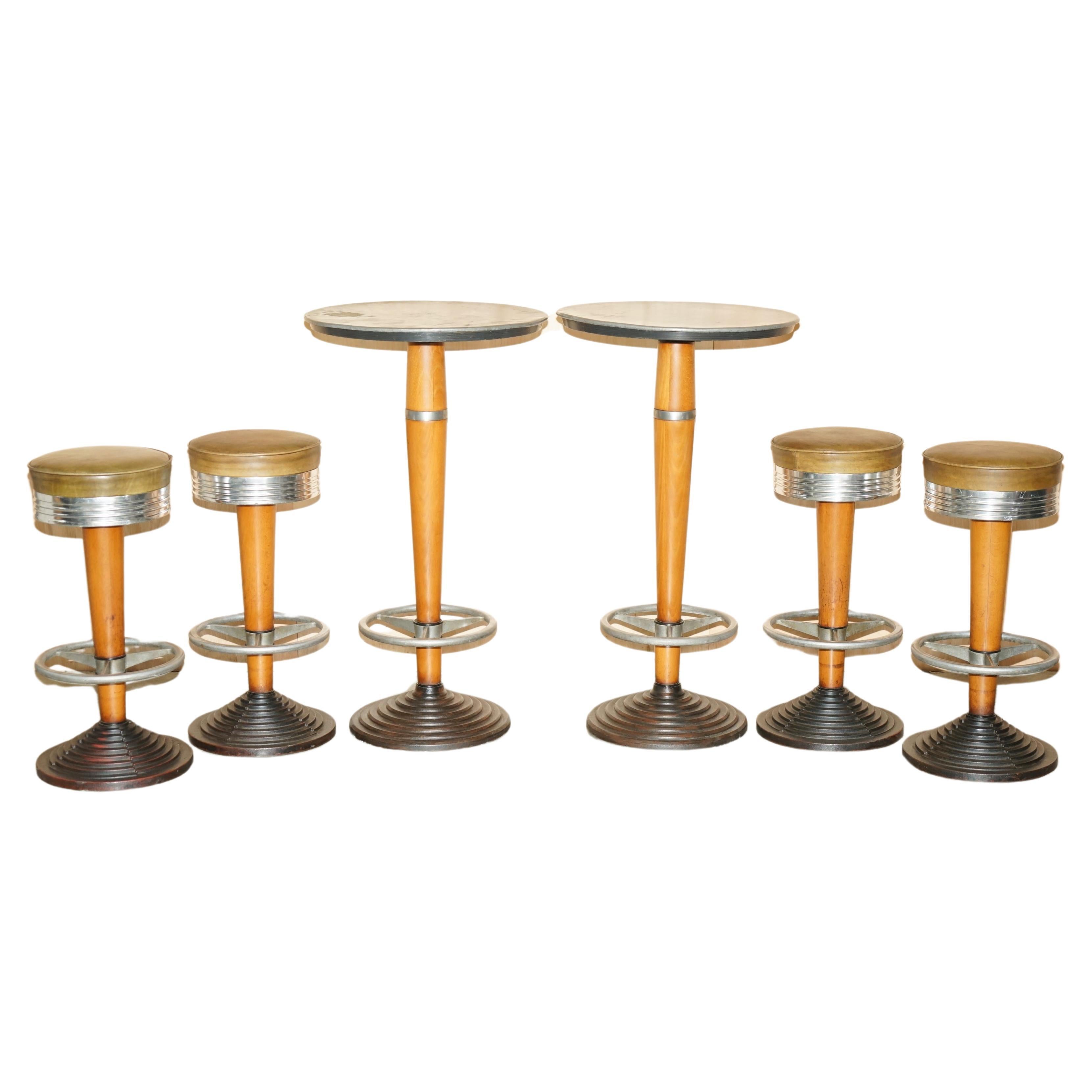 Royal House Antiques

Royal House Antiques is delighted to offer for sale this super rare suite of Art Deco bar stools with brown leather tops and matching zinc topped table

Please note the delivery fee listed is just a guide, it covers within the
