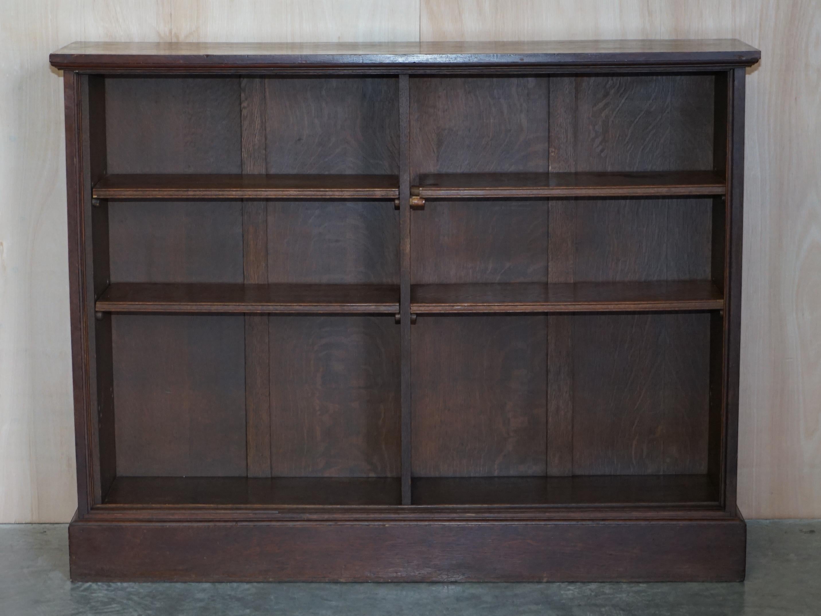 We are delighted to offer for sale 1 of 2 large dwarf open library bookcases circa 1880 in English oak

As mentioned this is one of two, the other is 60cm wider than this one and is listed under my other items, it is not included in this