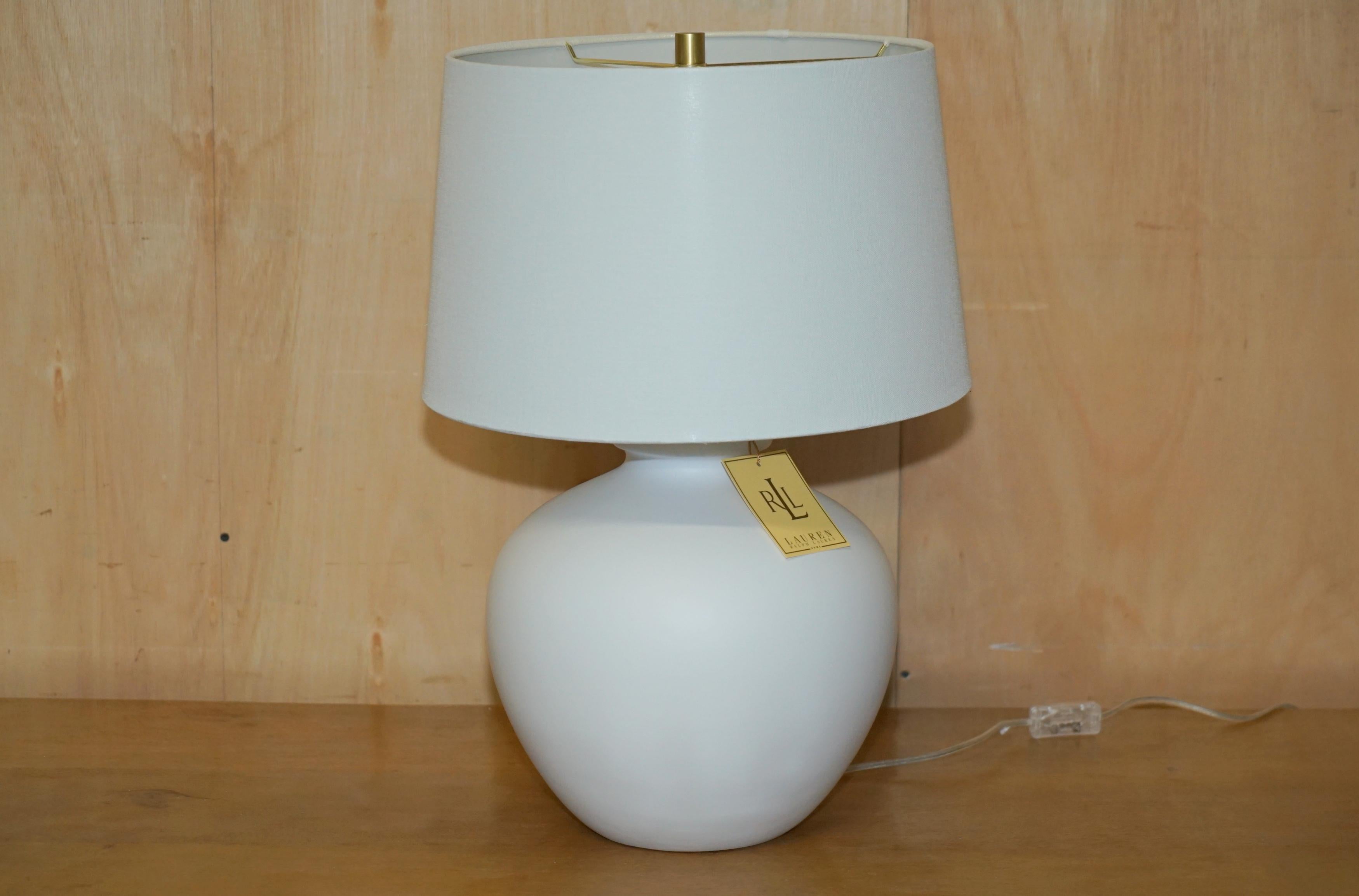 Royal House Antiques

Royal House Antiques is delighted to offer for sale 1 of 2 brand new in the original box Ralph Lauren ceramic white vase shaped table lamps

This lamp is part of a massive suite of Ralph Lauren lamps we bought for a show home