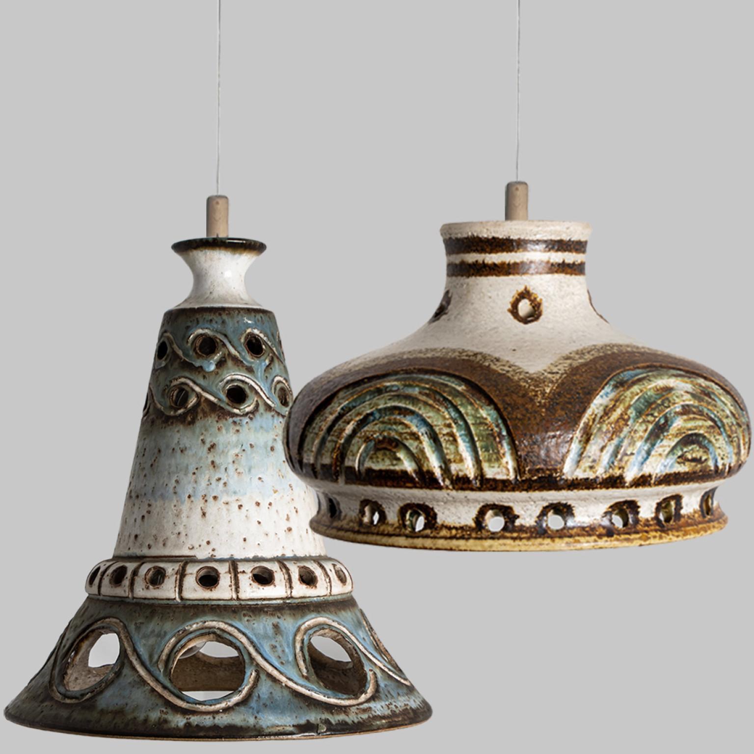 Playful arrangement of stunning round hanging lamps with an unusual shape, made with rich terra colored brown ceramics, manufactured in the 1970s in Denmark. We have a multitude of unique colored ceramic light sets and arrangements, all available in