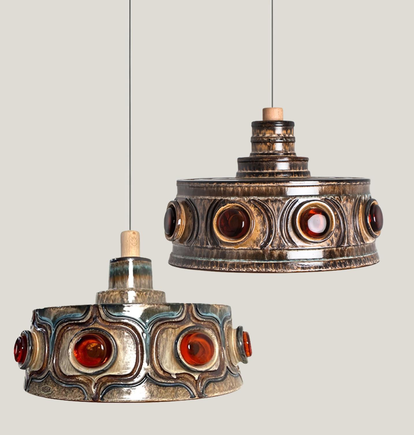 Playful arrangement of stunning round hanging lamps with an unusual shape, made with rich terra colored brown ceramics, manufactured in the 1970s in Denmark. We have a multitude of unique colored ceramic light sets and arrangements, all available on