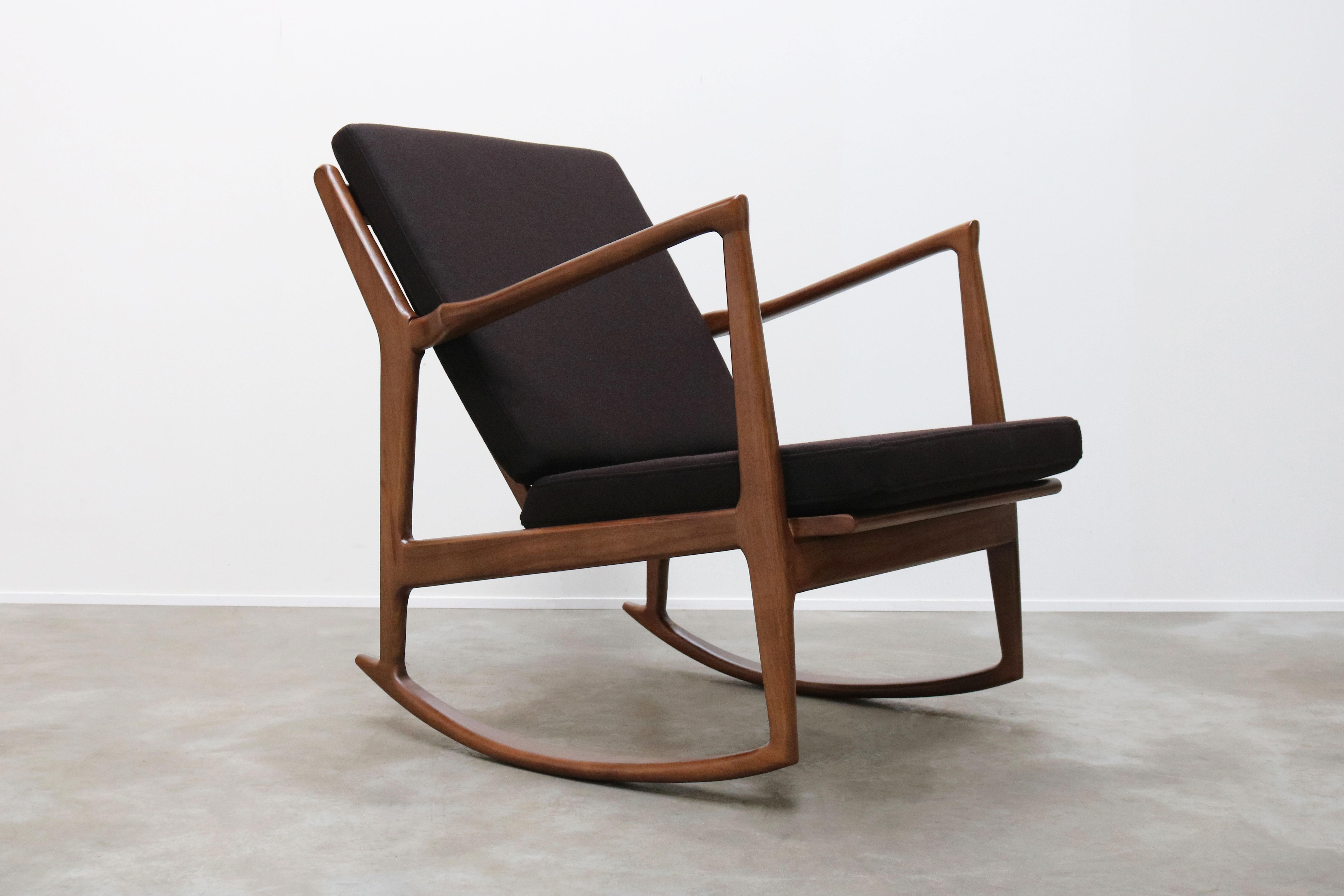 From our own workshop and design collection this gorgeous 1950 danish design style rocking chair.
Made out of solid walnut with a brown cashmere upholstery. The rocking chair looks amazing and is most comfortable
Great as a statement piece alone