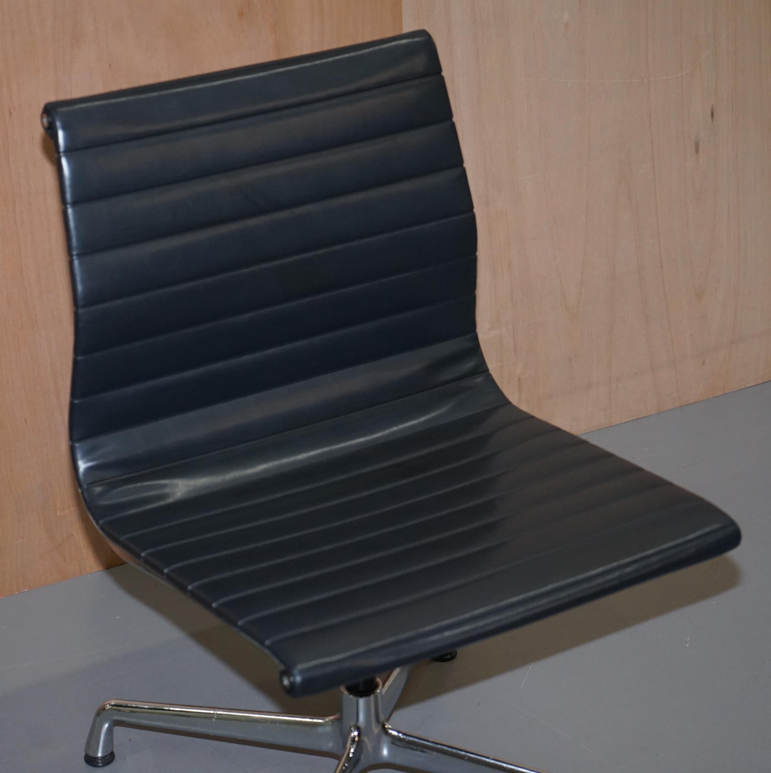 English 1 of 2  EA101 Vitra Eames Black Leather Office Swivel Conference Chairs