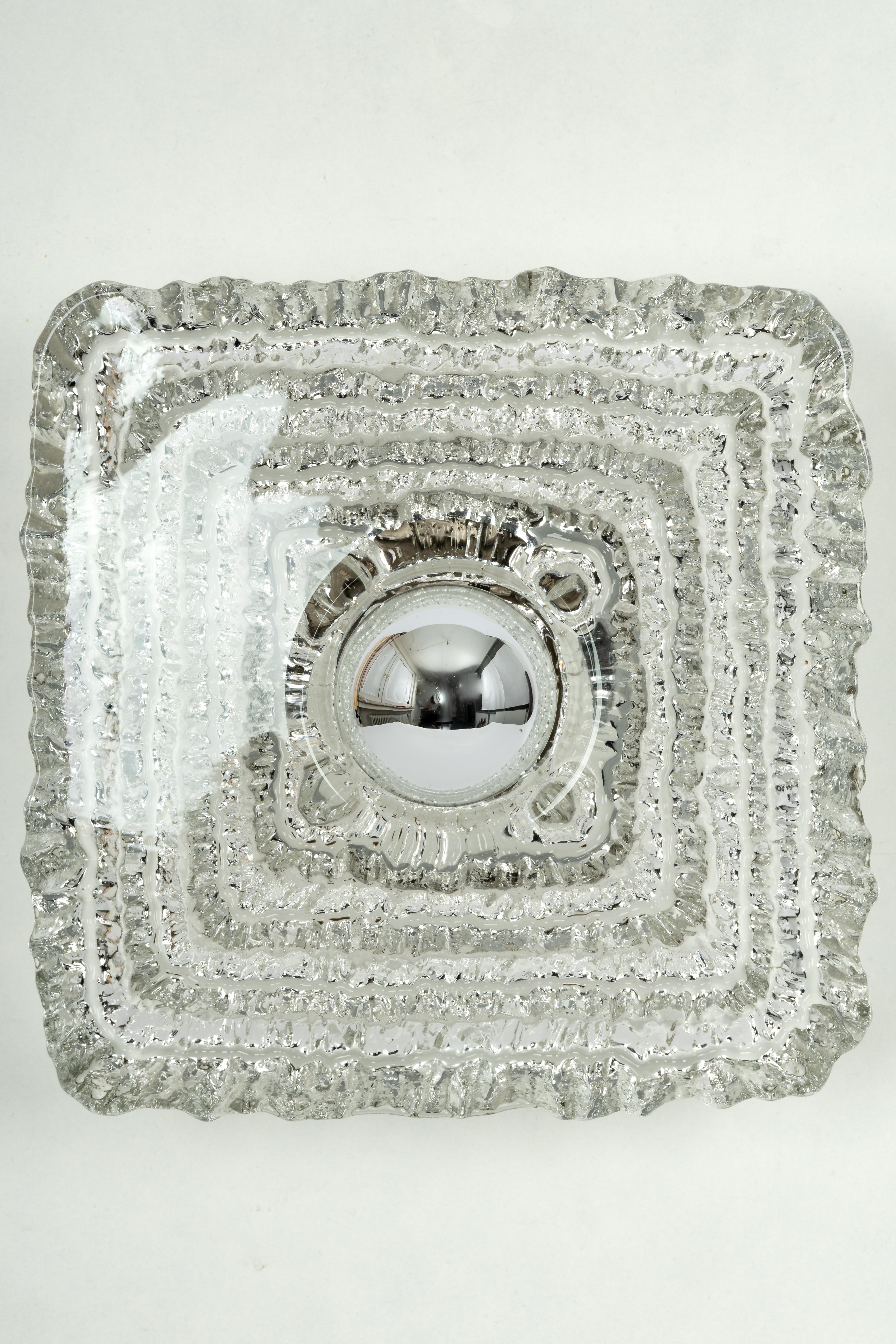 Exclusive Sputnik crystal glass wall sconce by Peil & Putzler, Germany, 1970s 
Wonderful light effect.
Extremely rare!

High quality and in very good condition. Cleaned, well-wired and ready to use. 

Each fixture requires 1 x E27 Standard