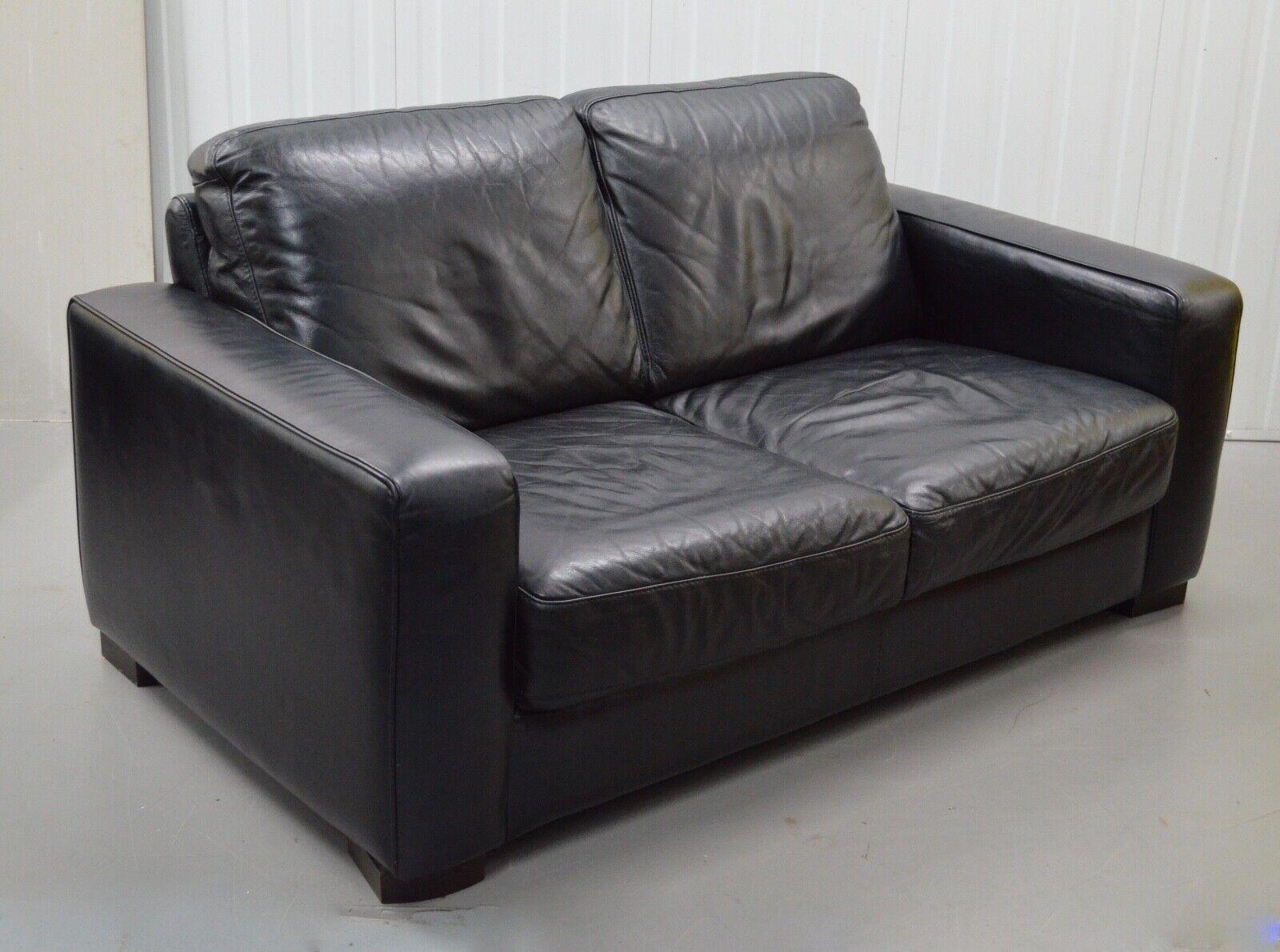 natuzzi black leather sofa