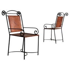 1 des 2 fauteuils tourbillonnants artisanaux français en fer forgé et cuir cognac, années 1980