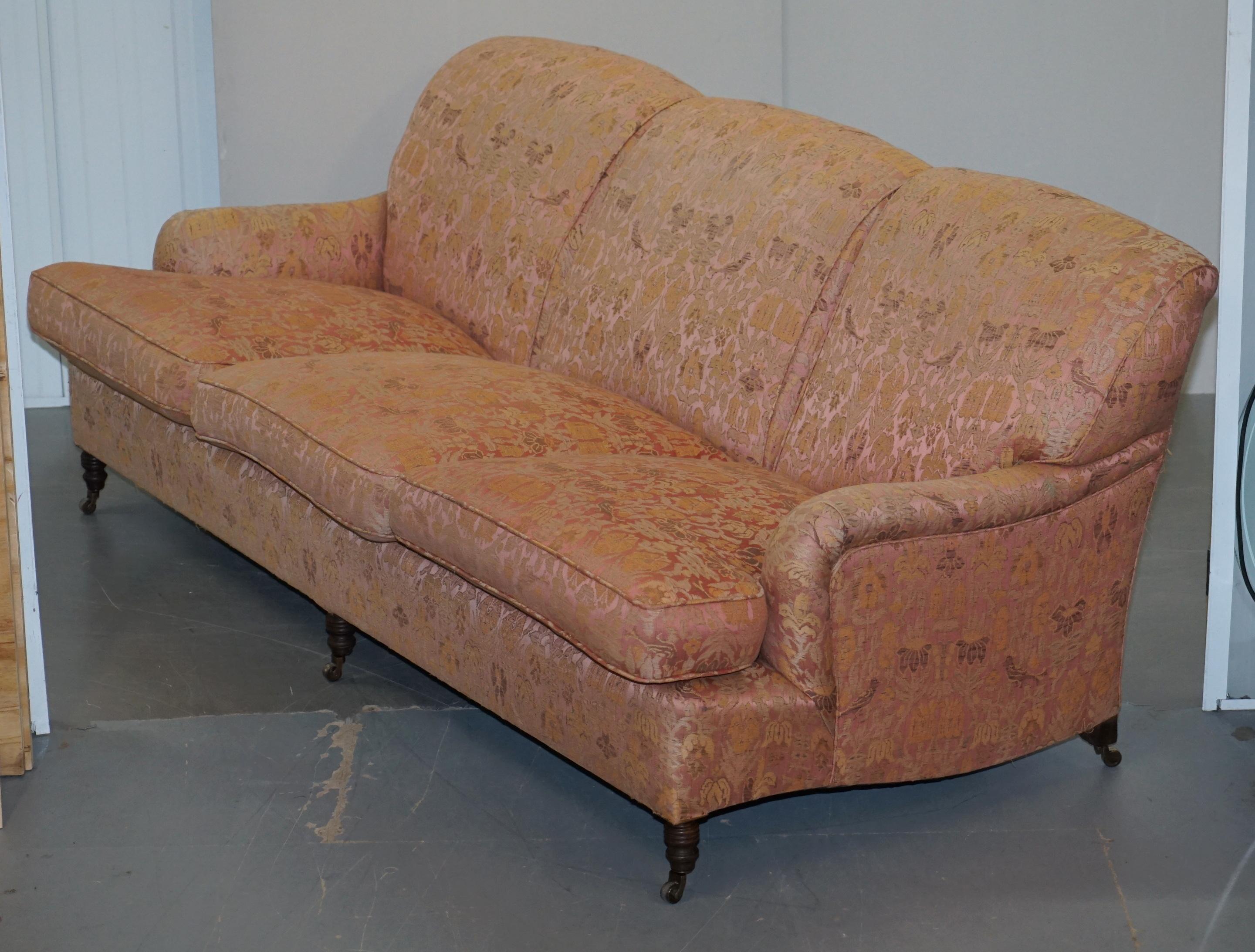 We delighted to offer for sale this lovely full sized huge George Smith Signature Scroll arm sofa RRP £13,000 with faded salmon pink embroidered upholstery of birds and flowers 

George Smith Chelsea make some of the finest handmade in England