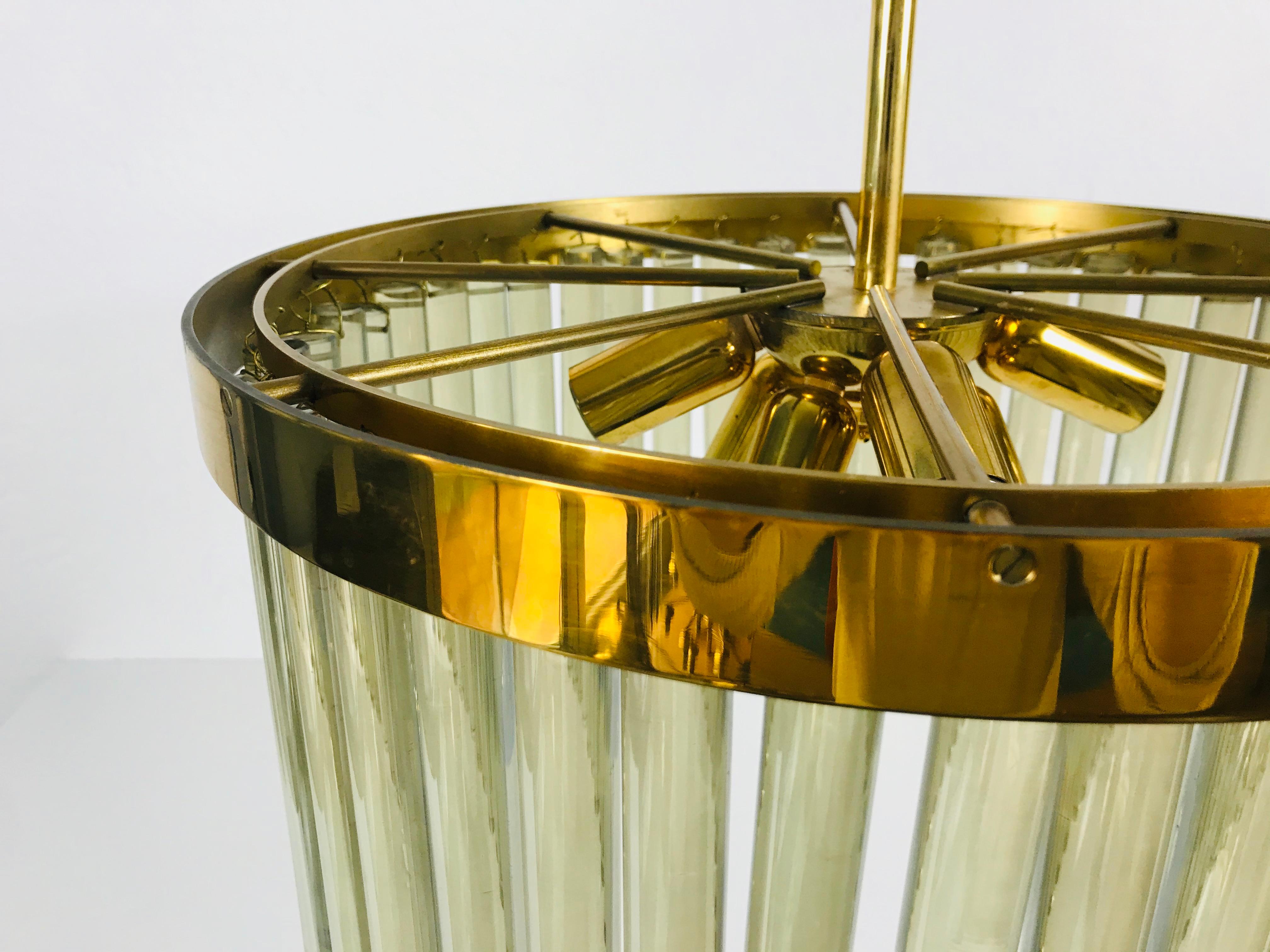 Mid-20th Century 1 of 2 Golden Gilded Brass and Crystal Glass Chandelier by Christoph Palme, 1960 For Sale