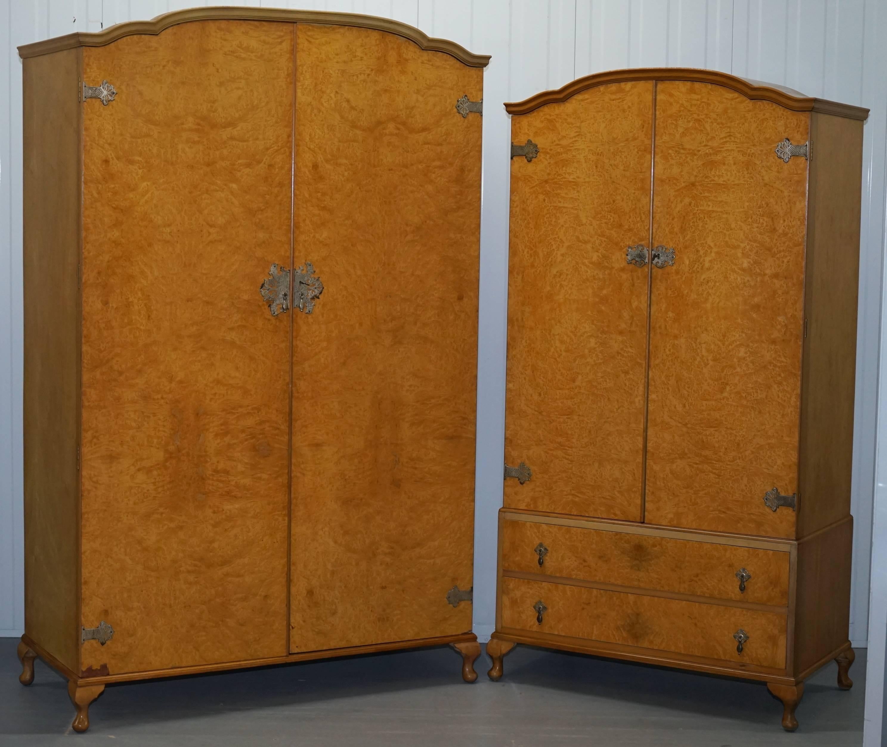 We are delighted to offer for sale one of two Heirloom Furniture Est 1889 burr walnut wardrobes

This auction is for the smaller one with the drawers

Both pieces are in exceptional condition throughout, the burr walnut, is expertly cut and has