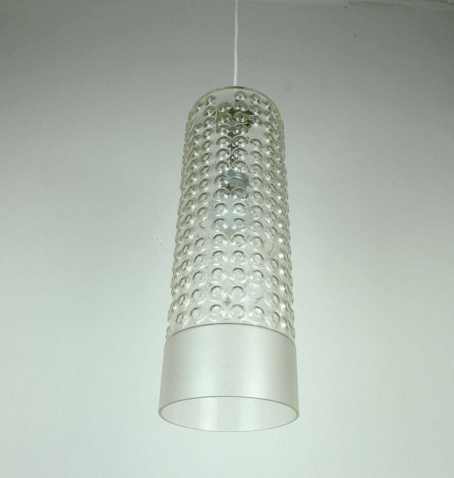 Very beautiful and elegant pendant light designed by Rolf Krueger in 1967 for Staff Leuchten. Long cylindrical clear Peill glass shade with bubble surface and etched rim. White electric wire, original Staff canopy.

Condition: very good, no damage