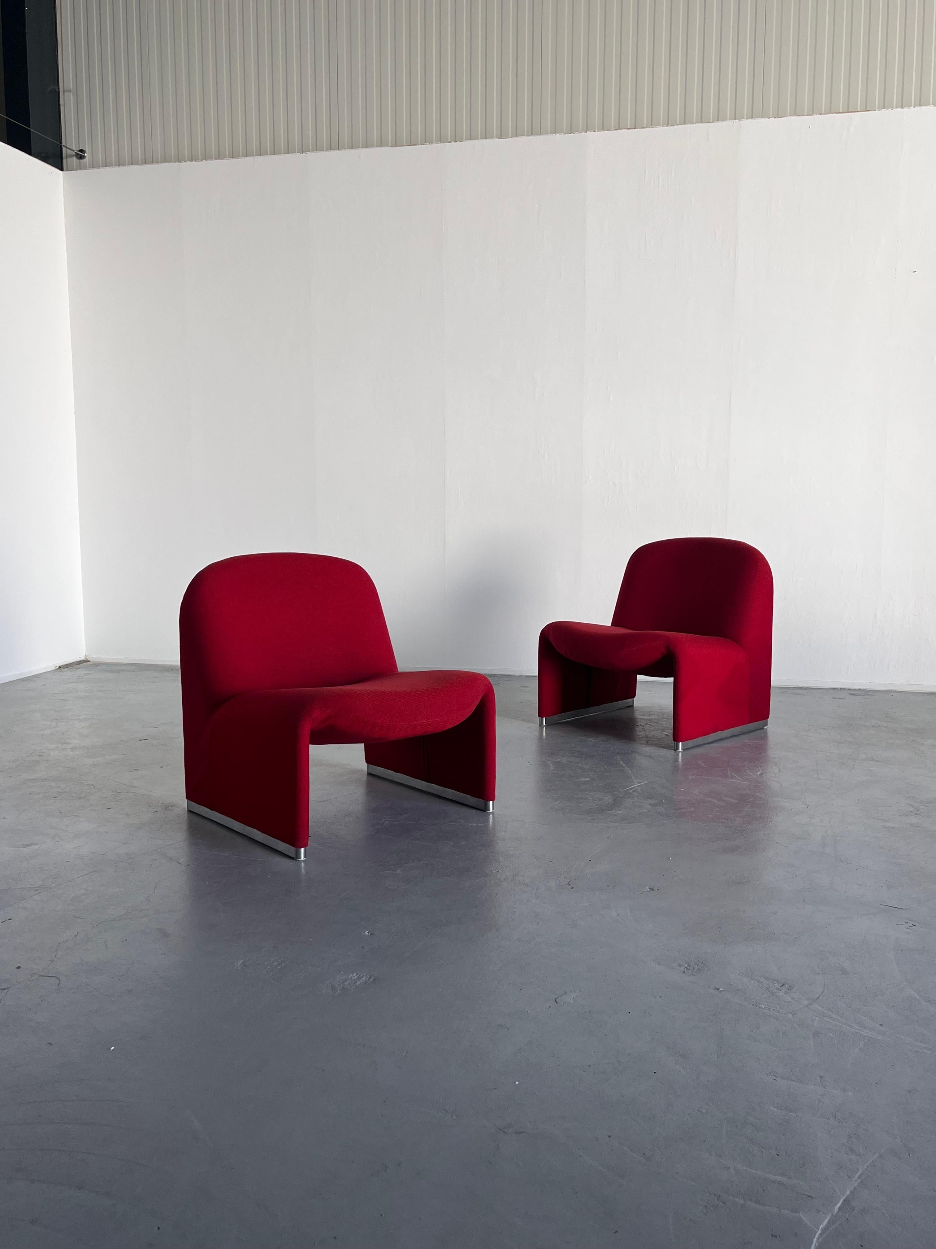 Two original vintage iconic 'Alky' chairs, designed by Giancarlo Piretti for Anonima Castelli. Produced in the early 1970s in Italy.

Iconic Italian design. 

Original vintage condition and original upholstery.
Very well preserved with expected