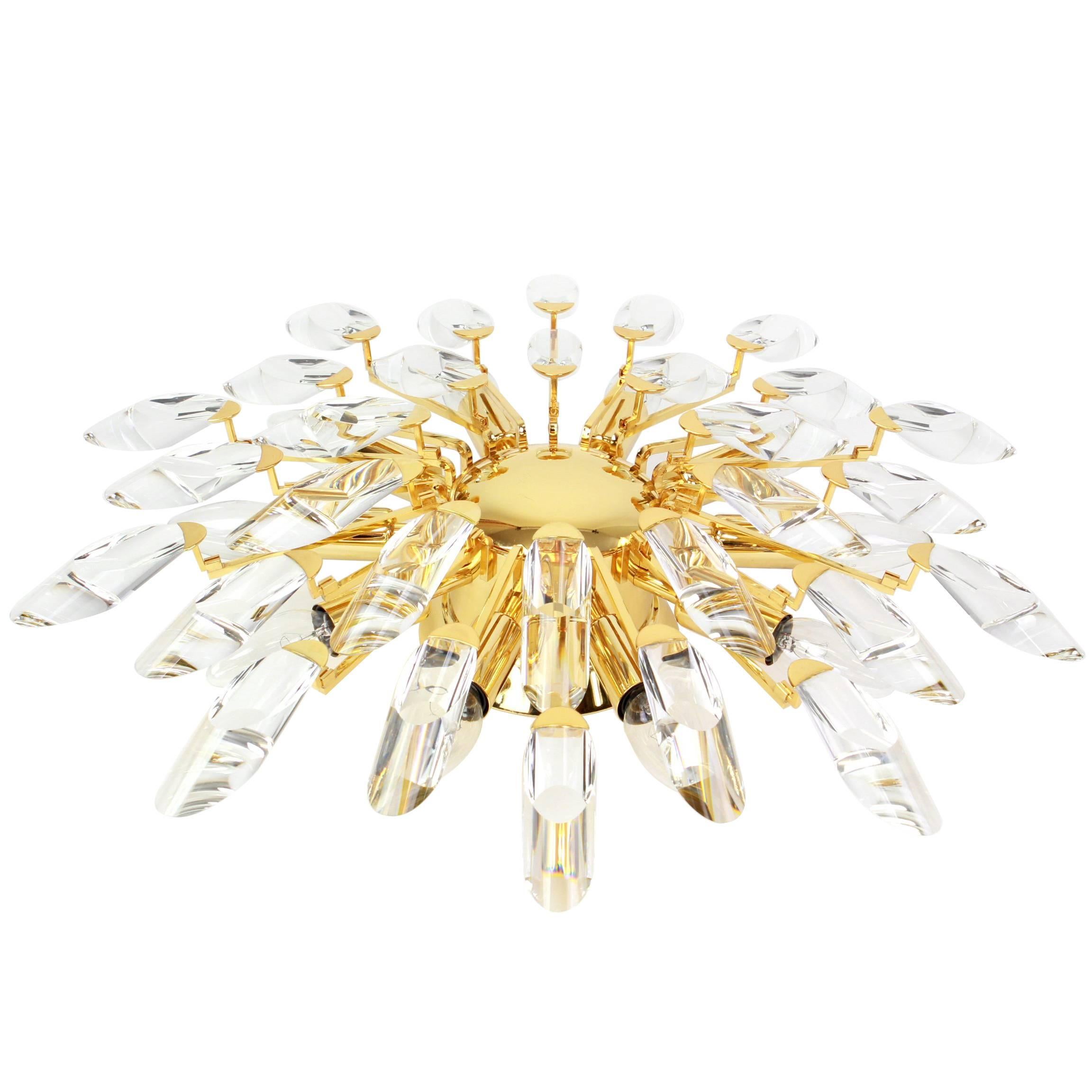 Stunning ceiling light fixture by Stilkronen, Italy, manufactured in midcentury, (1970s-1980s). It is made of gold-plated (24-carat) brass with cut crystal glasses.
Sockets: 10 small Edison base bulbs- E-14 and compatible with the US/UK/ etc.