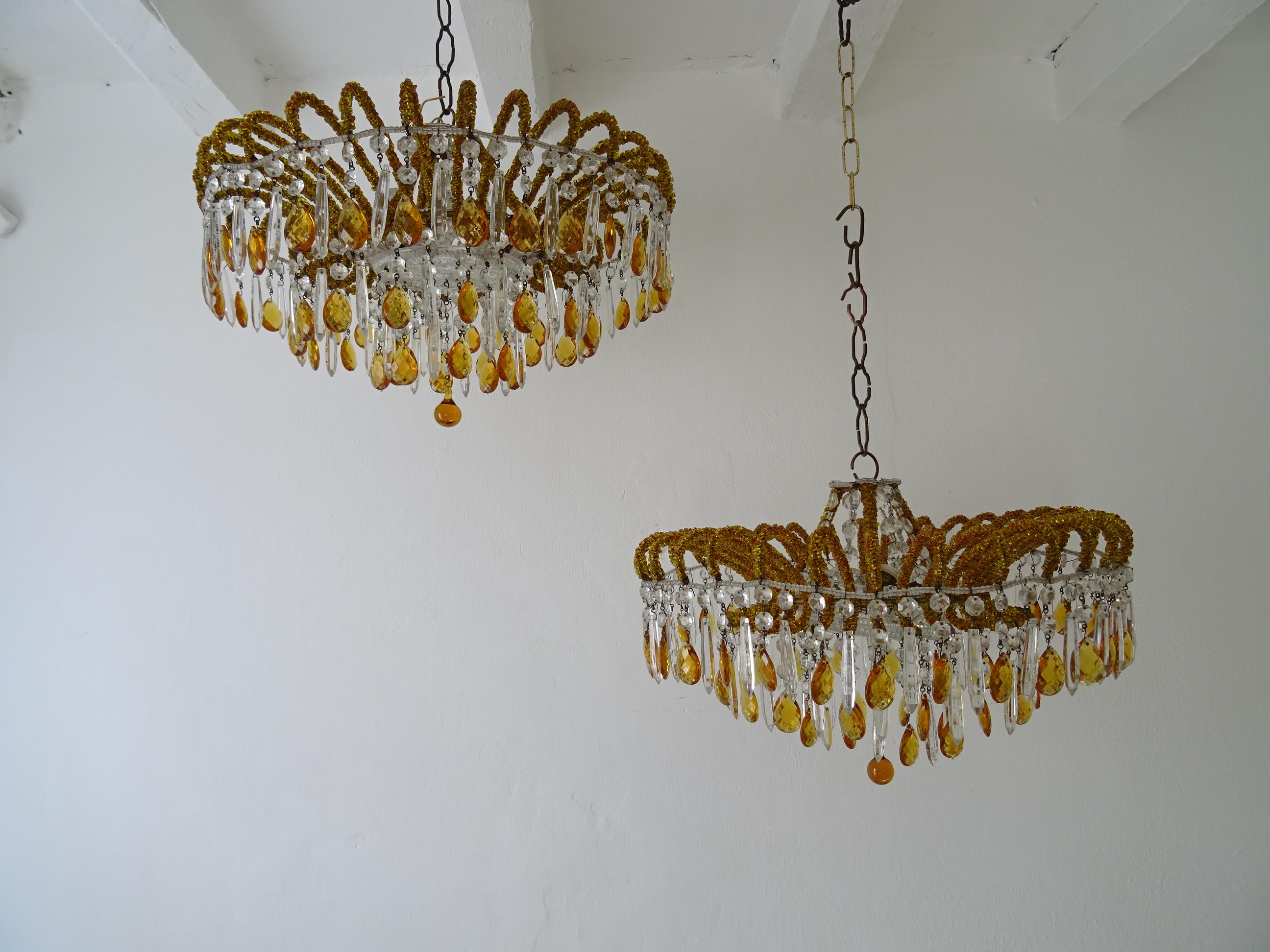 I have two if interested, but this listing is for one only. Housing 3 lights each. Will be re-wired with appropriate UL US socket for the USA or certified socket for other countries and ready to hang. Micro beaded throughout. Rare yellow amber with