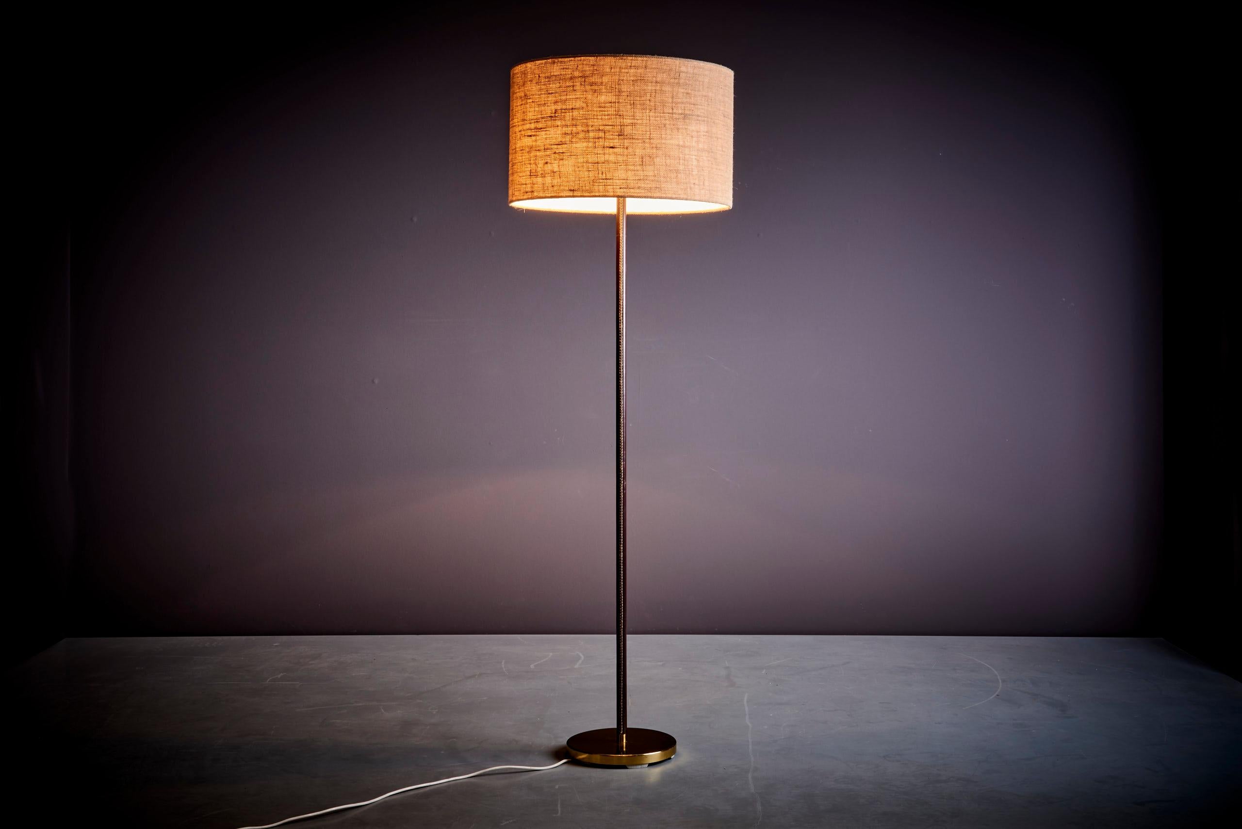 1 of 2 Kalmar Leuchten Leather Wrapped solid Brass floor lamp, Austria - 1960s. The measurements given apply to the lampbase.

Please note: Lamp should be fitted professionally in accordance to local requirements.