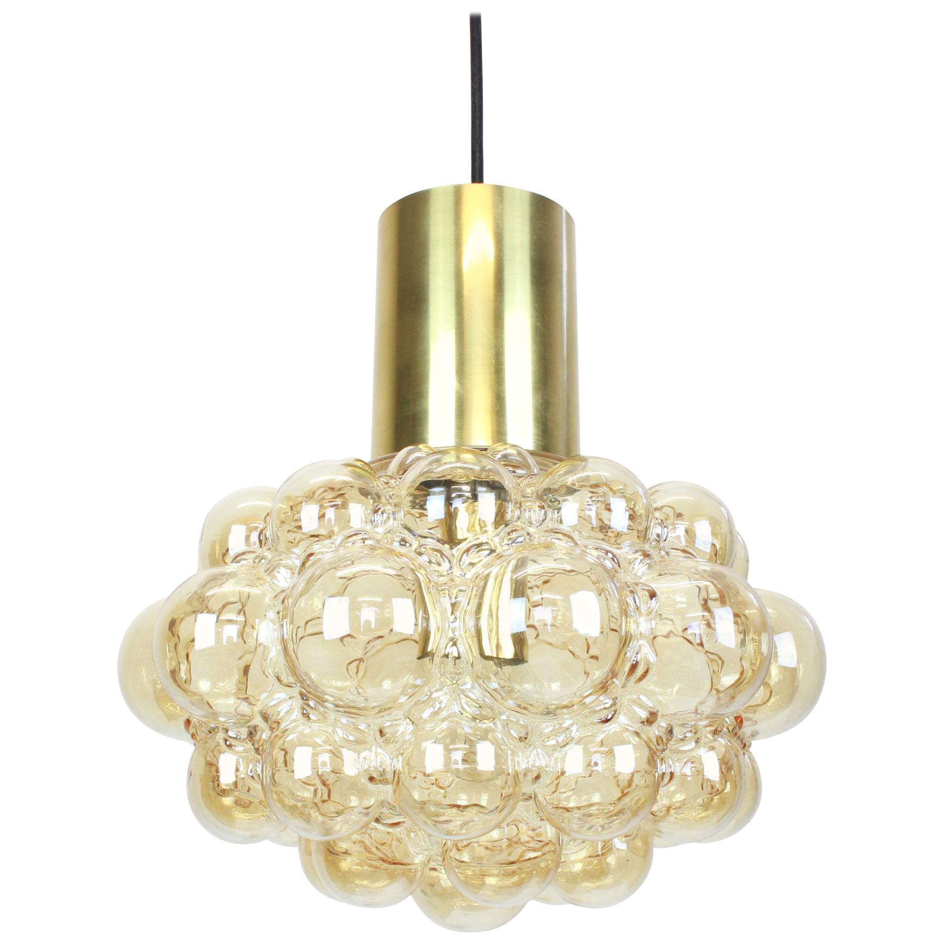 A large round smoke tone bubble glass pendant designed by Helena Tynell for Limburg, manufactured in Germany, circa 1970s.

Sockets: Needs 1 x E27 standard bulb with 100W max each and compatible with the US/UK/ etc. standards
Drop rod can be