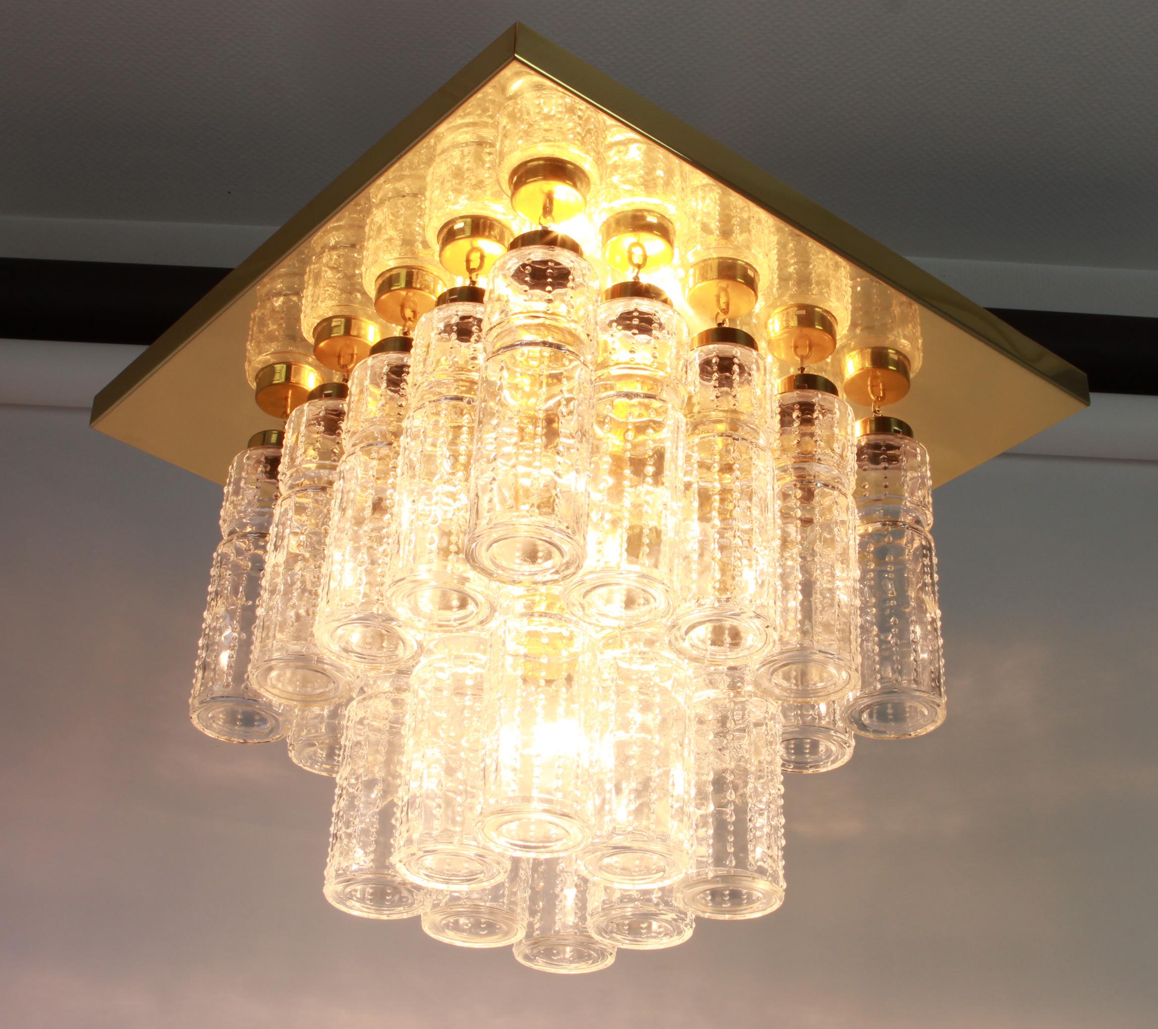 Rare two-tier flush mount or chandelier with hand blown glass pieces on a brass base made by Glashütte Limburg.

Heavy quality and in very good condition. Cleaned, well-wired and ready to use. The fixture requires 5 x E27 Standard bulbs with 60W