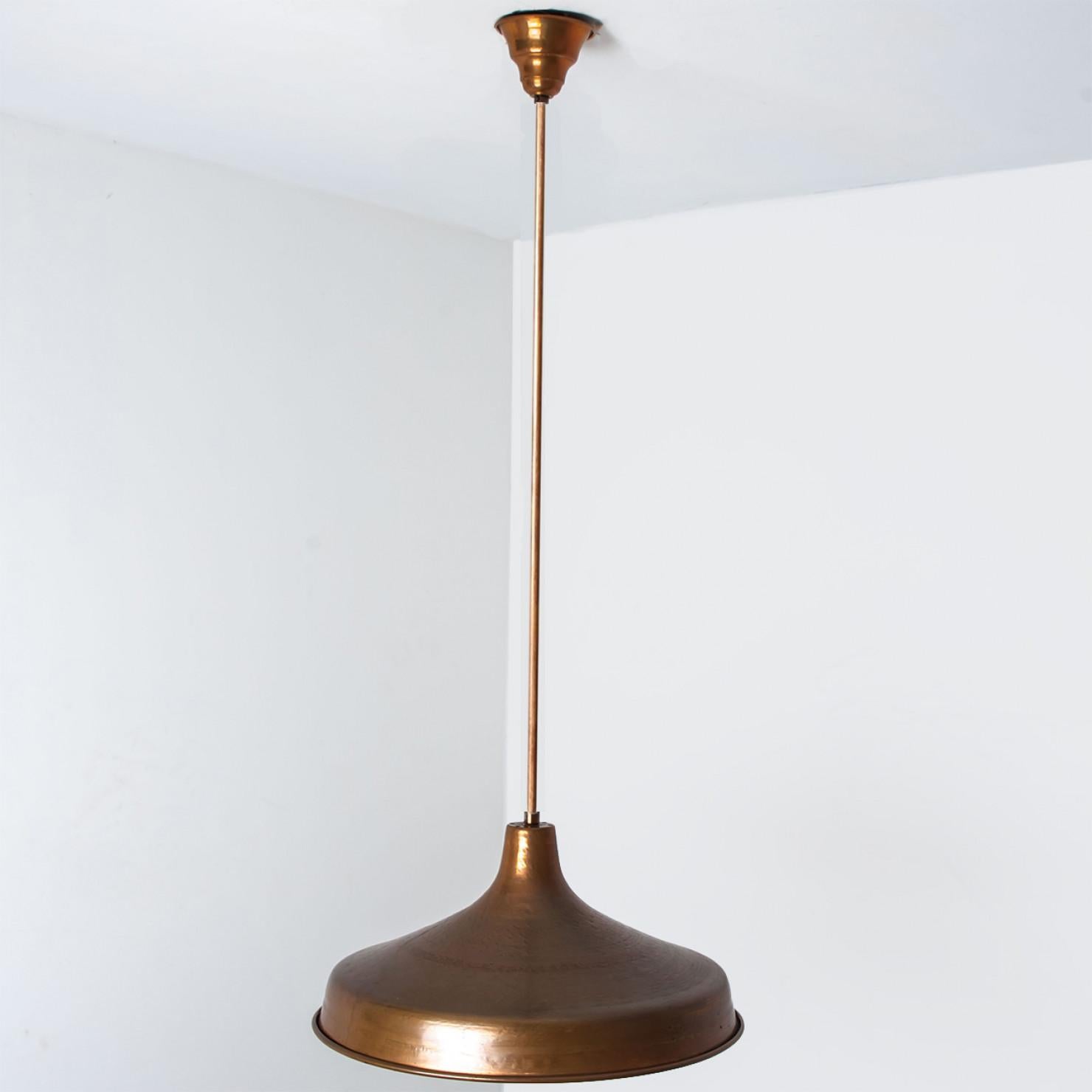 This pair of beautiful copper lamps from the Danmark. A warm and used color of copper.

Dimensions model: Diameter 19.68 inch/50 cm Height 9.84/25 cm.

Each light requires 1X E27 Light bulb.

