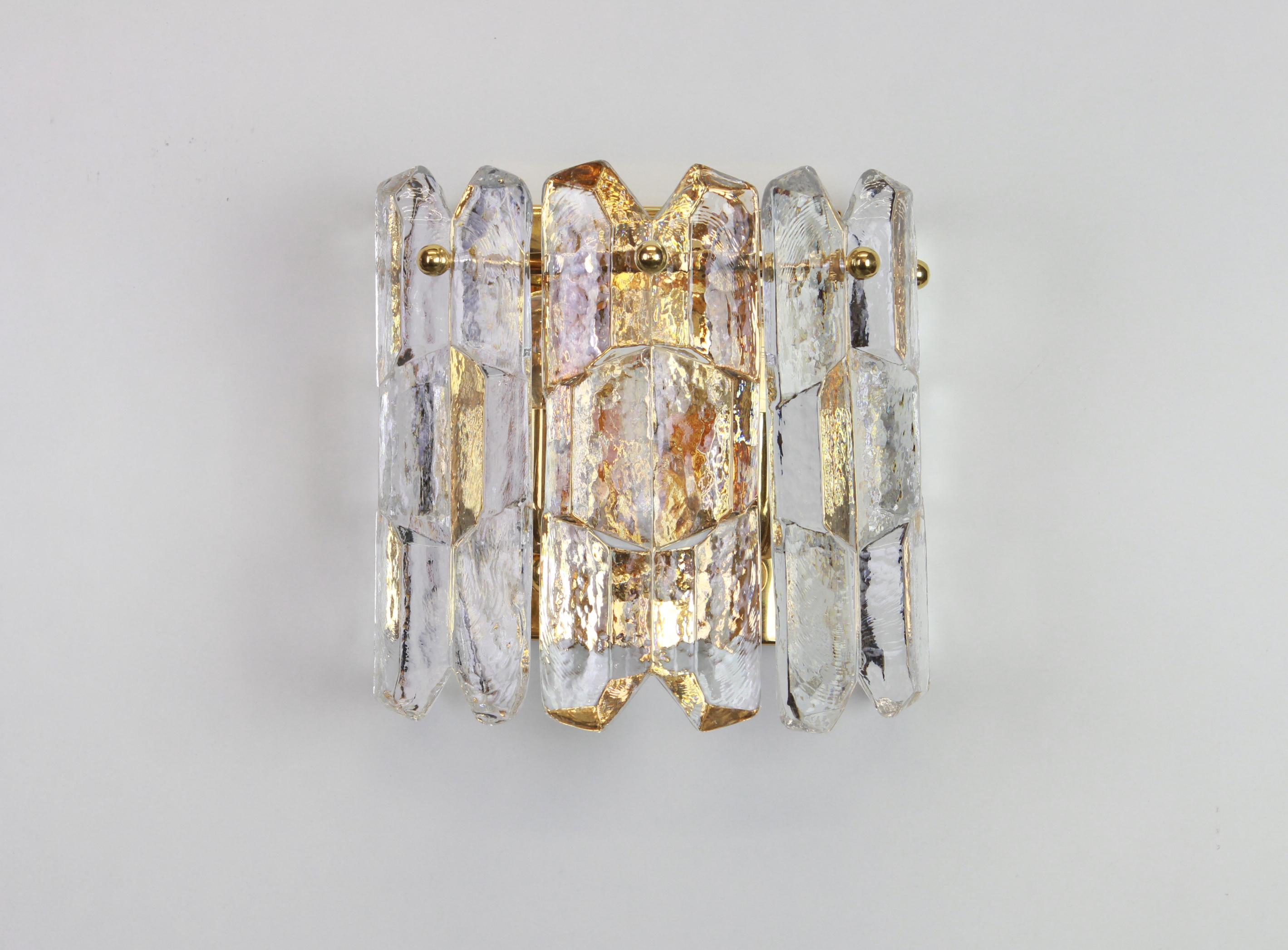 1 of 4 Wonderful midcentury wall sconces with five Murano glass pieces placed on a 24-carat gold-plated frame, made by Kalmar, Austria, manufactured, circa 1960-1969.

High quality and in very good condition. Cleaned, well-wired.

Each fixture
