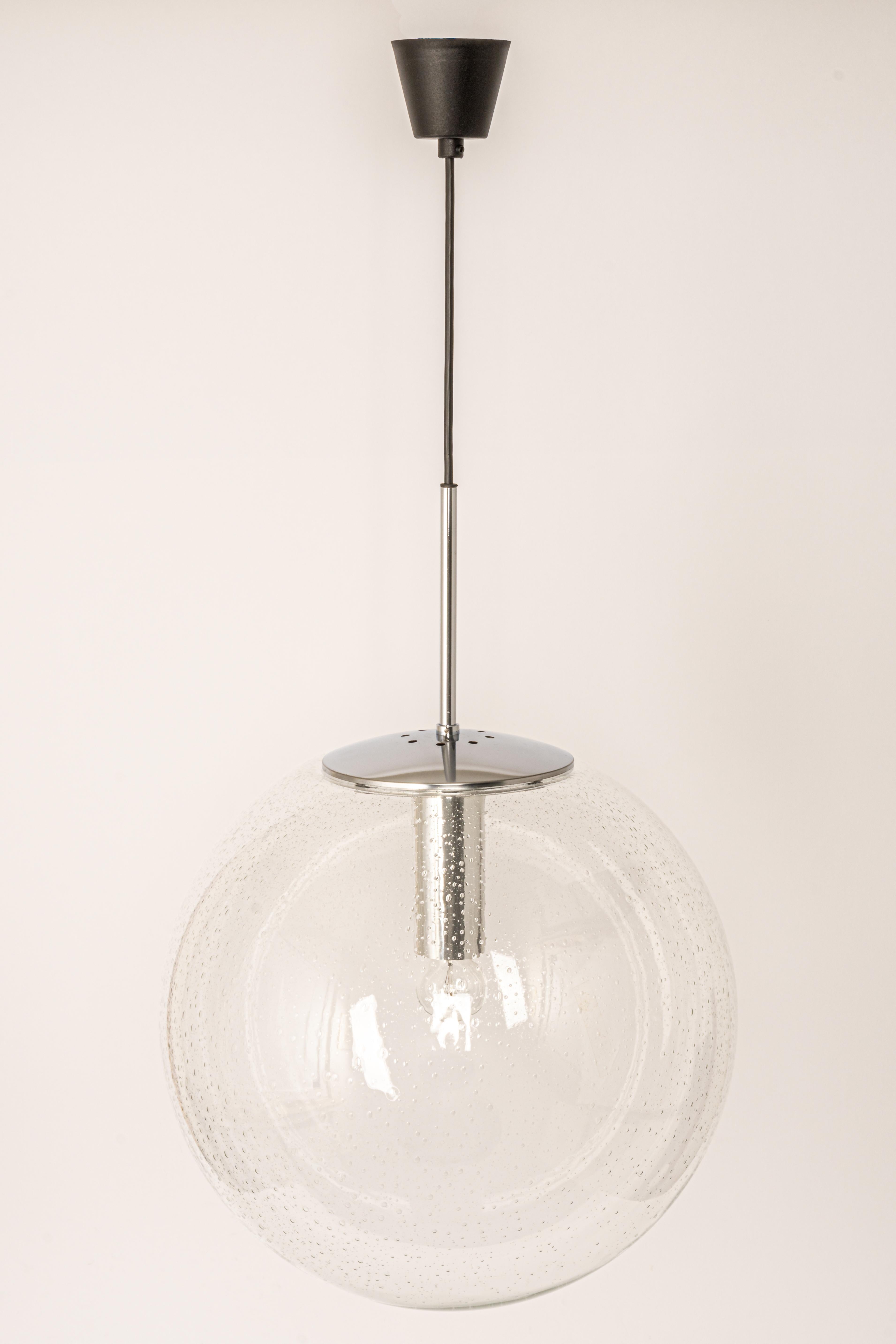 Mid-Century Modern 1 of 2 Large Limburg Chrome with Clear Glass Ball Pendant, Germany, 1970s For Sale